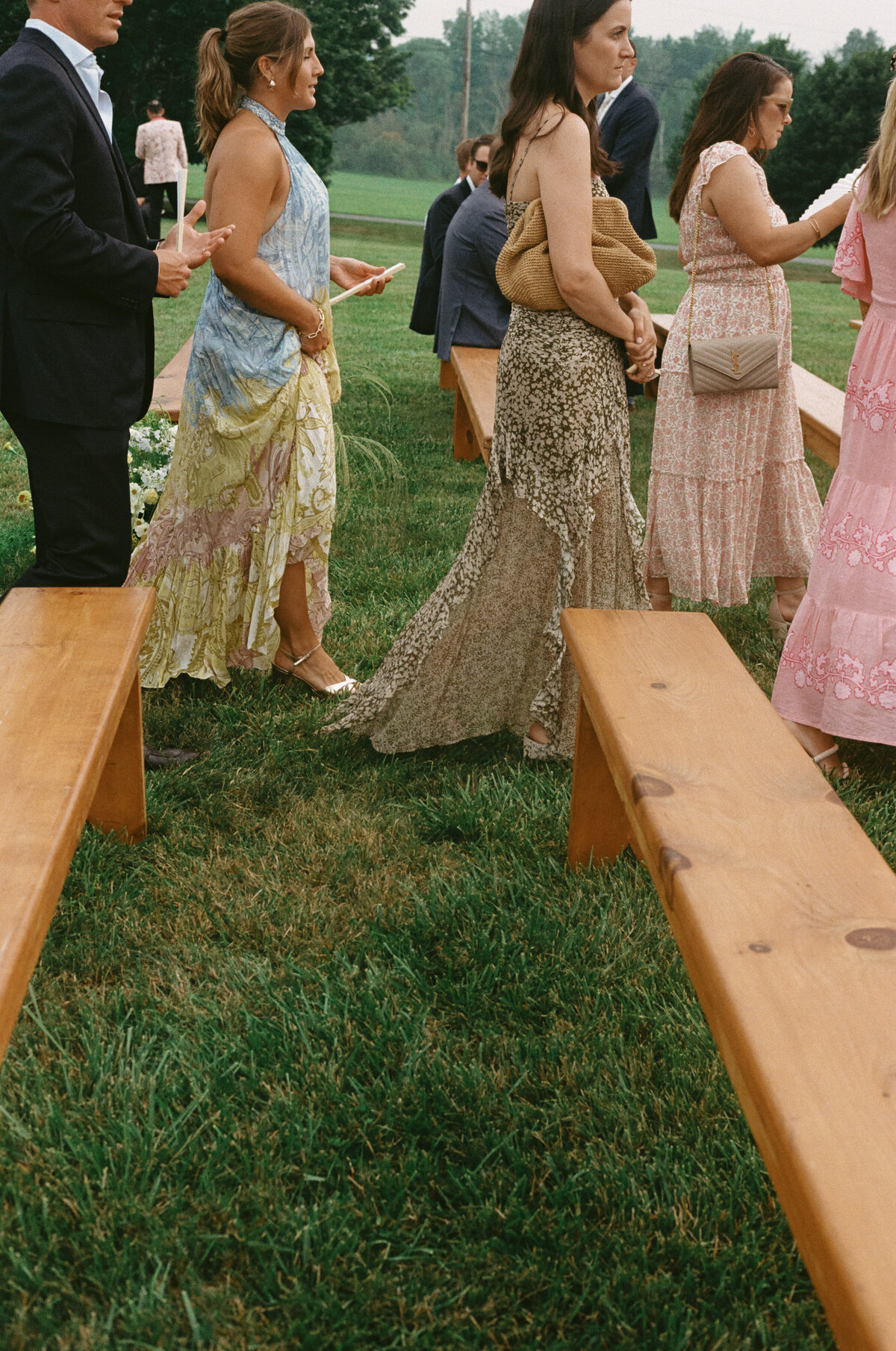 Sophisticated editorial detail photography showcasing luxury wedding aesthetics at Lion Rock Farm. Lauren Alatriste's fashion photography background elevates
  wedding documentation, creating destination venue imagery that feels both editorial and genuinely celebratory.