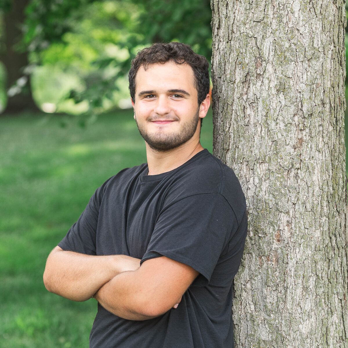 Columbus senior photography session at sunset, featuring a high school senior posing at North Bank Park.