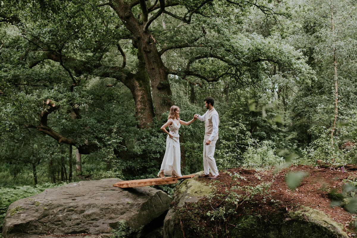 Bride and groom portrait in woodland