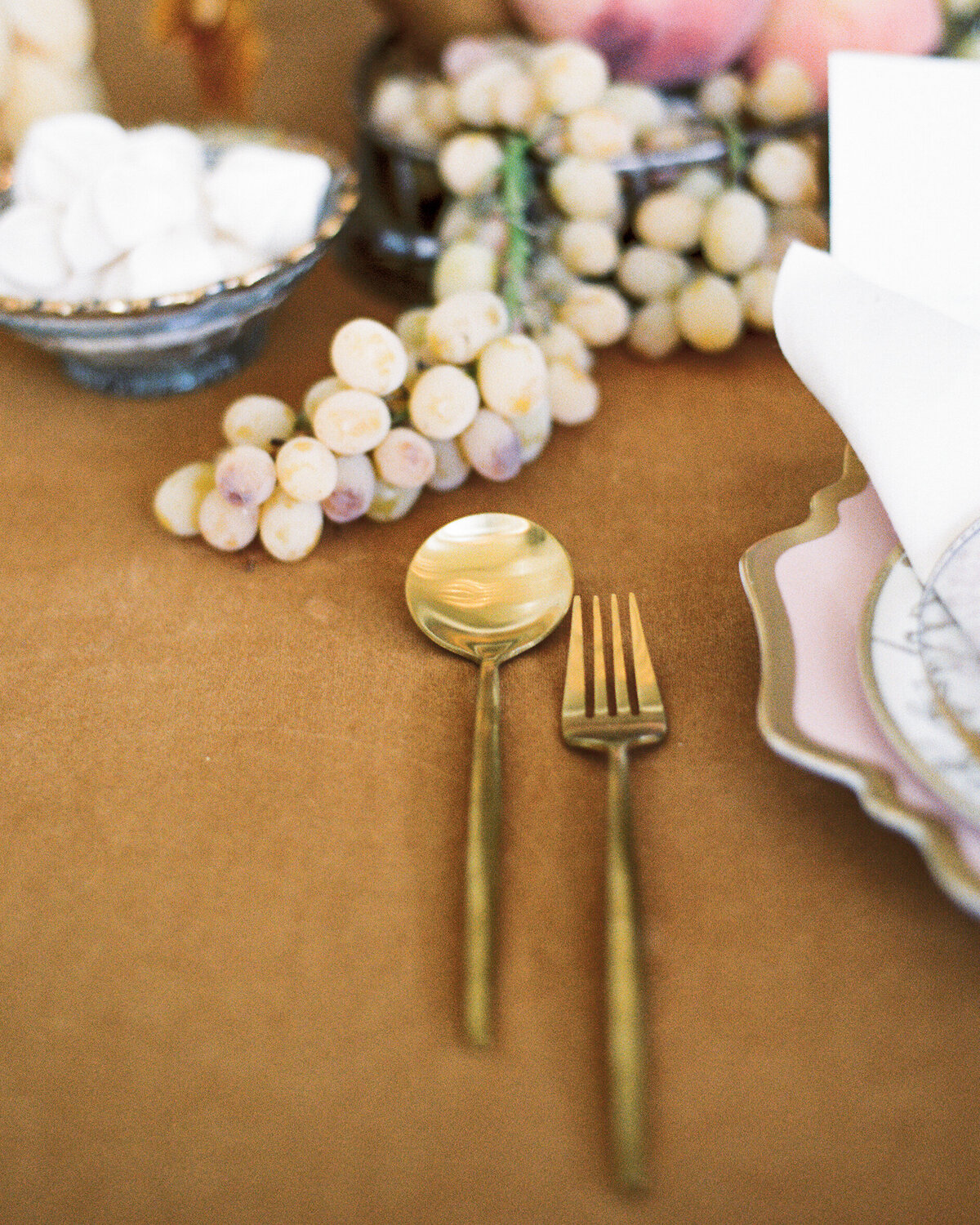 Gold silverware on table