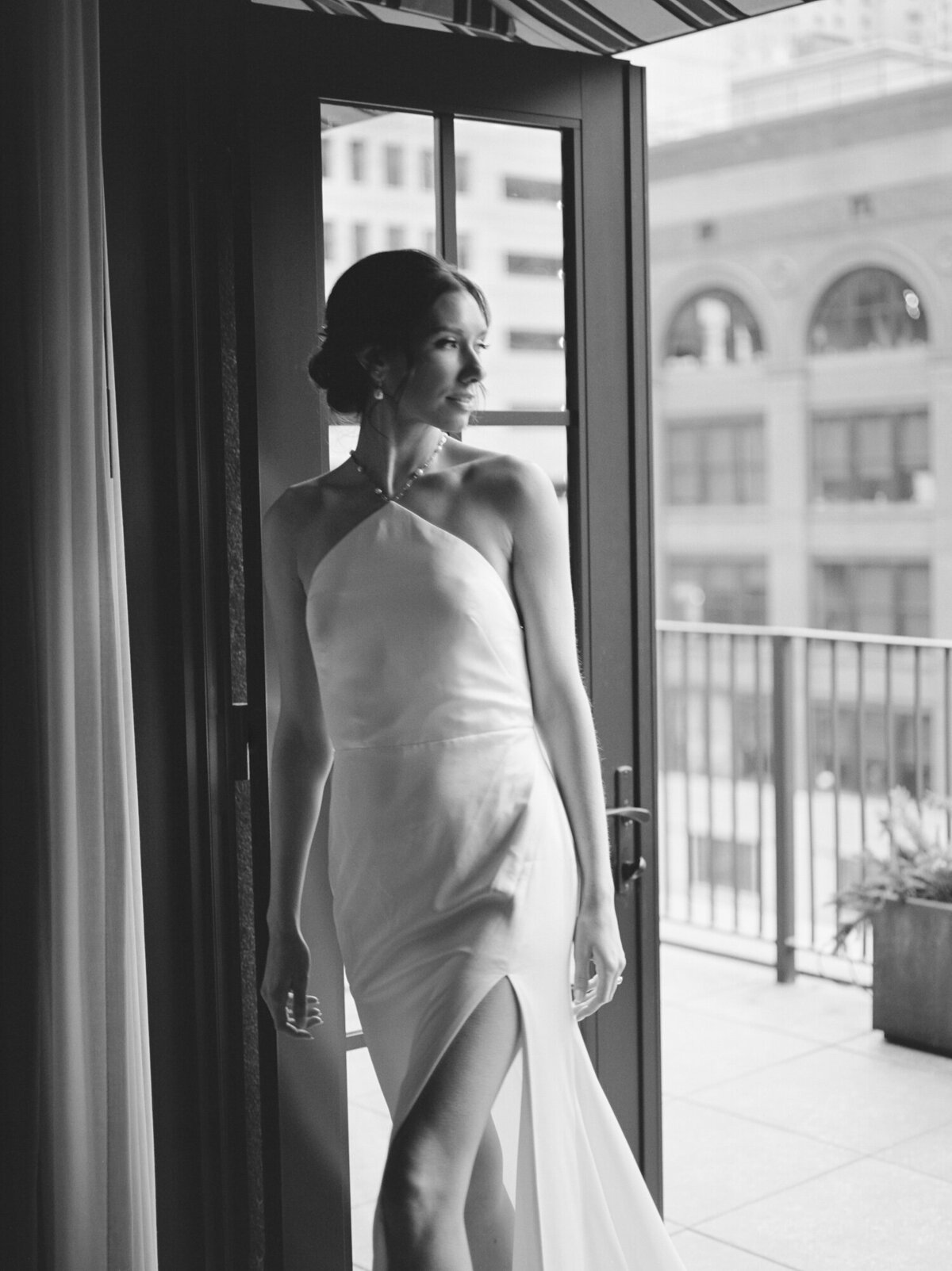 bride in pearl wedding dress, candid wedding photography, movement wedding photography in Michigan