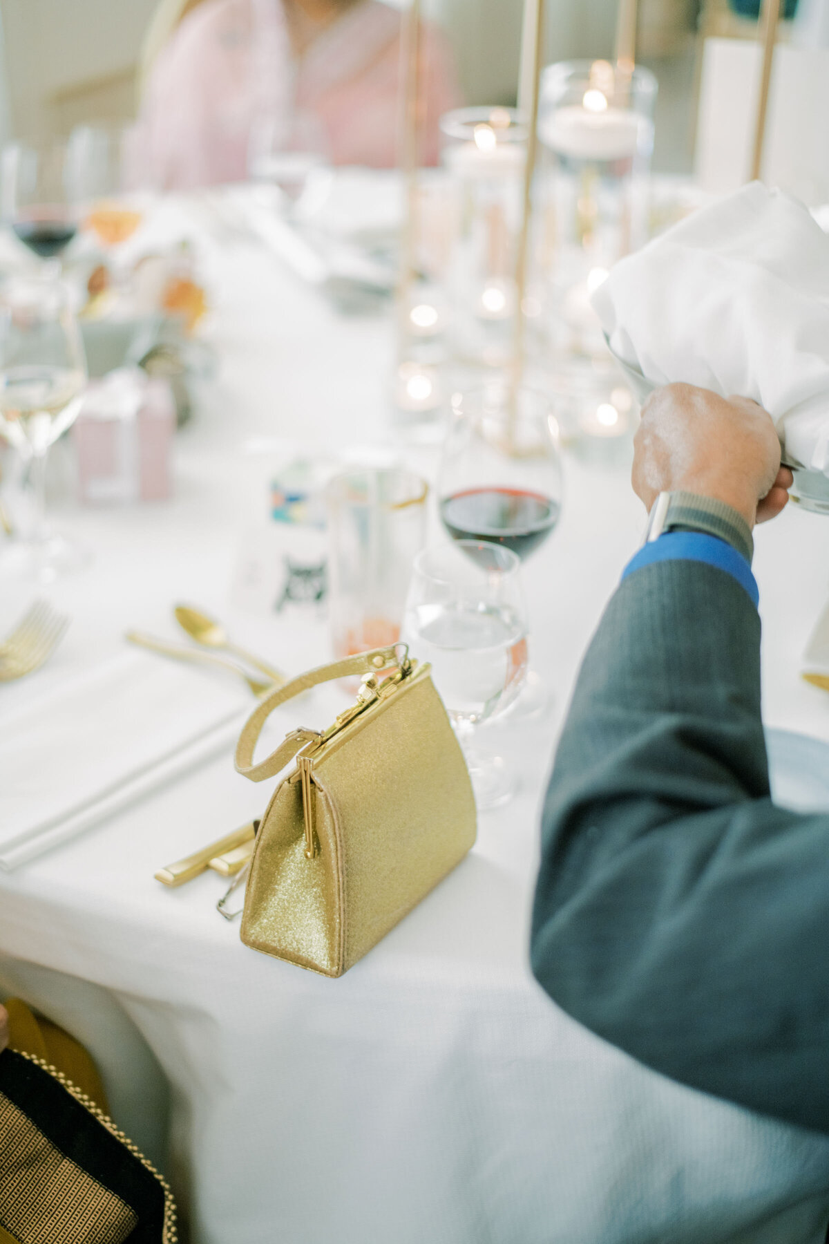 a purse at the venue at the pearle hotel at a wedding