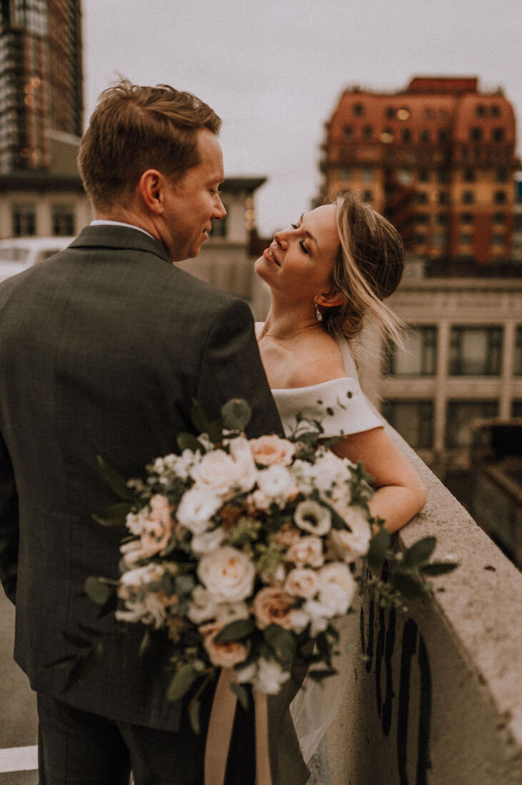 bride and groom looking at each other