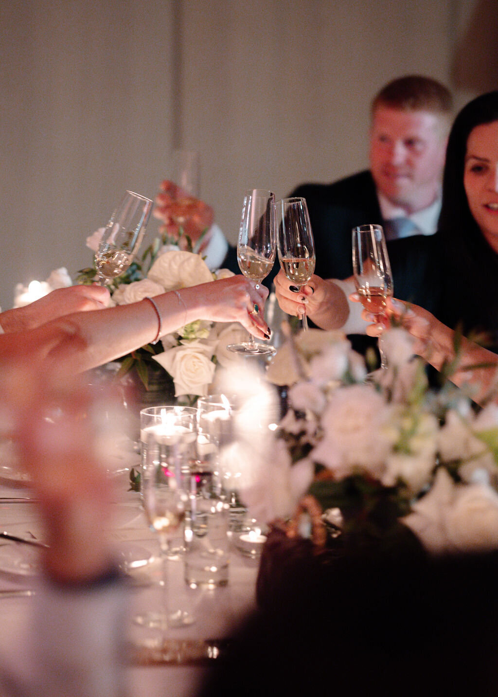 Guests toasting champagne at a wedding at Public Hotel in Manhattan