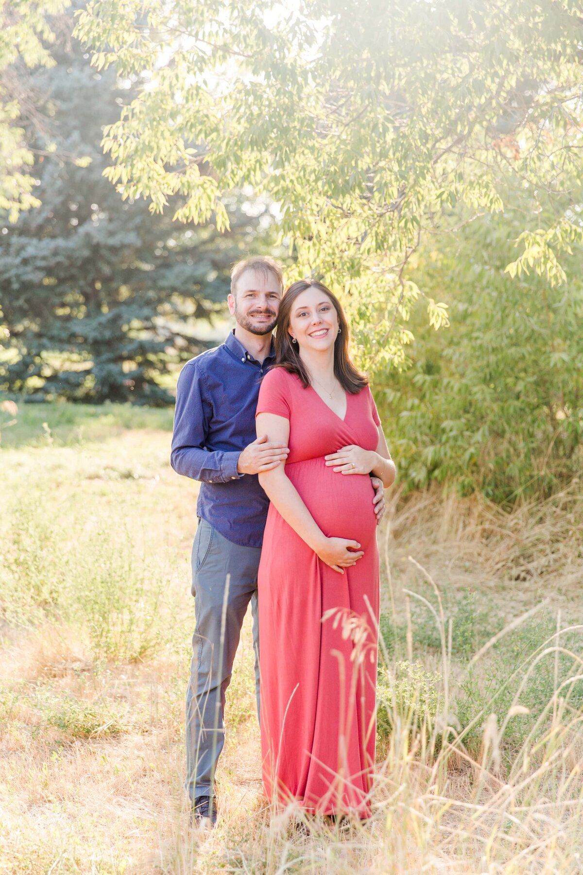 husband and wife and baby belly portrait at Majestic View Park in Arvada, CO