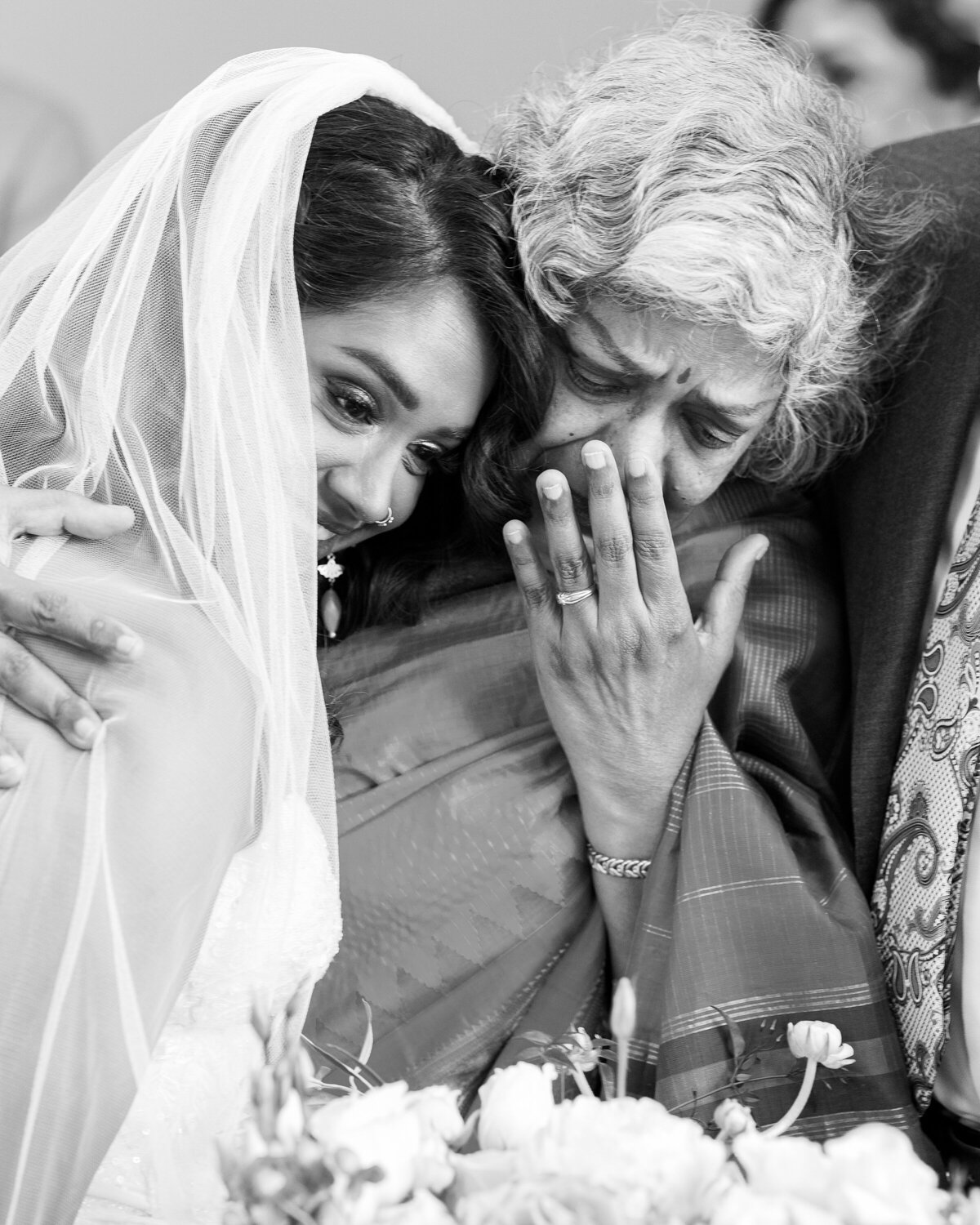 Mother of the bride cries seeing daughter ready to walk down the aisle Indian wedding
