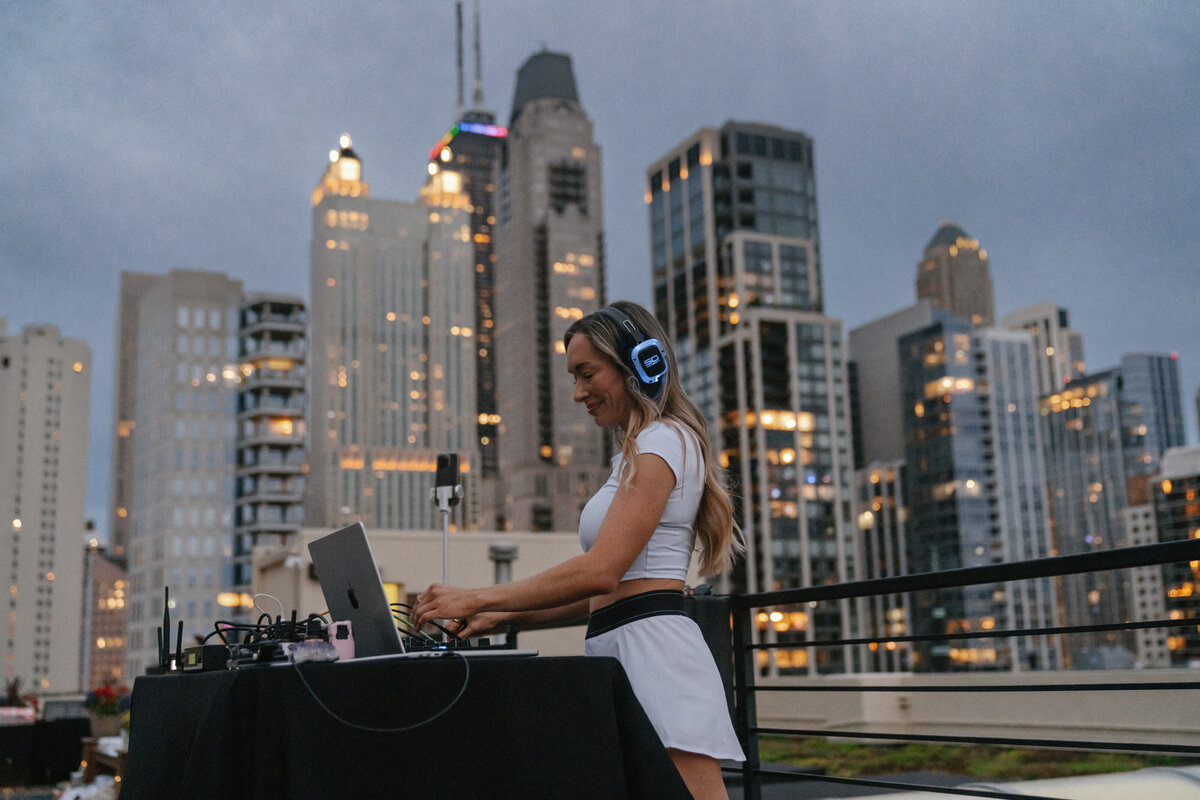 Picture of women DJ'ing