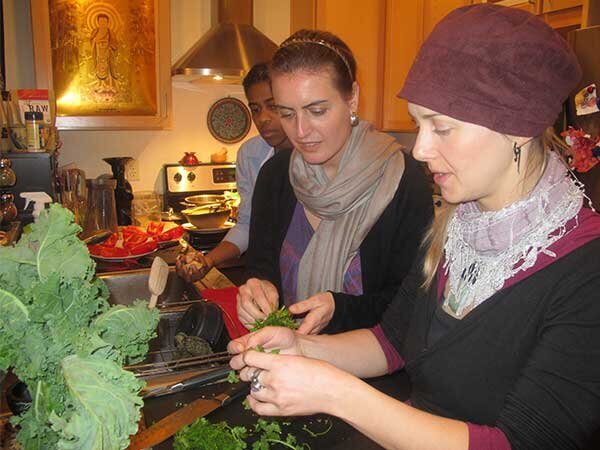 Students preparing fresh herbs for salad