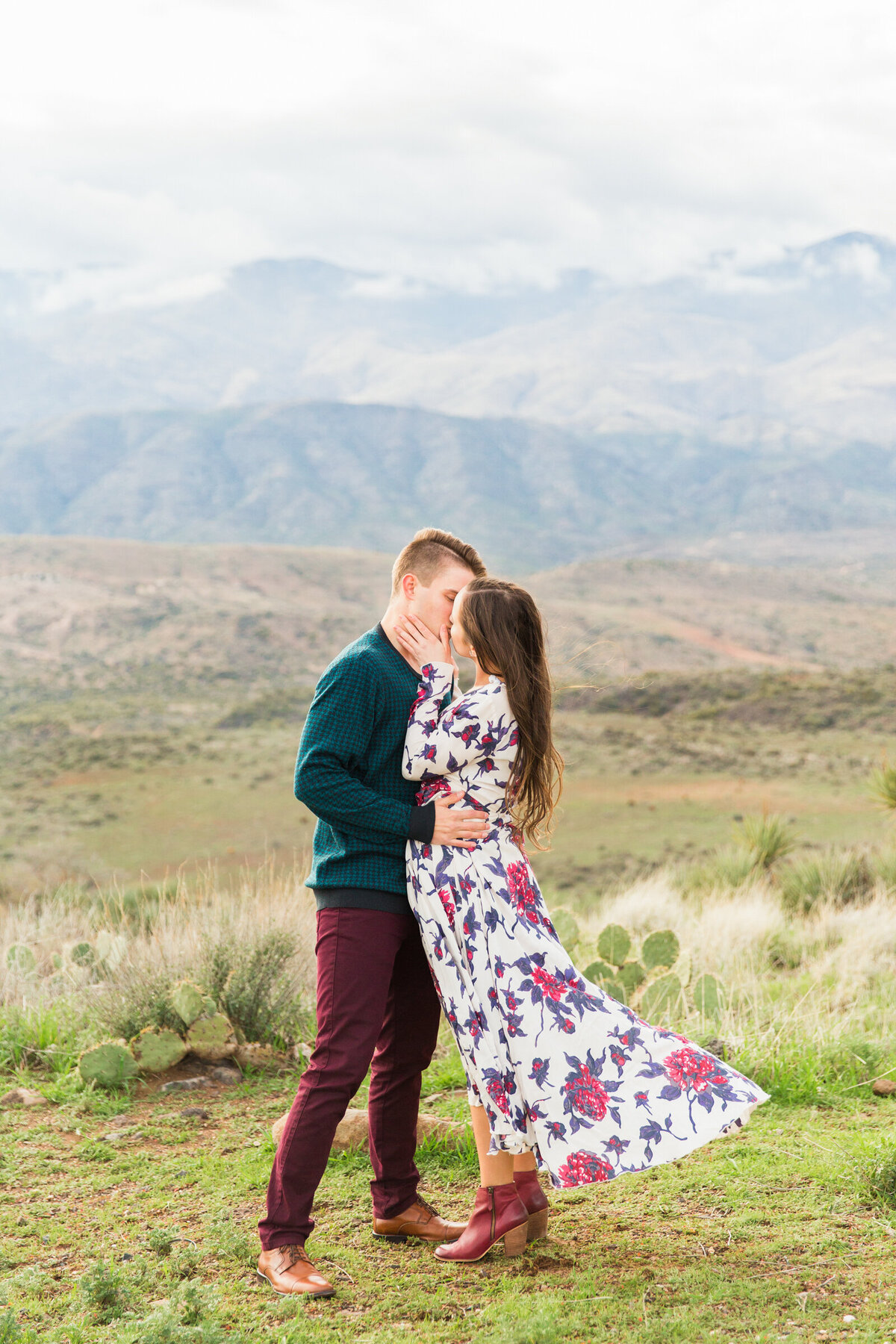 engaged couple posing together for engagement photo