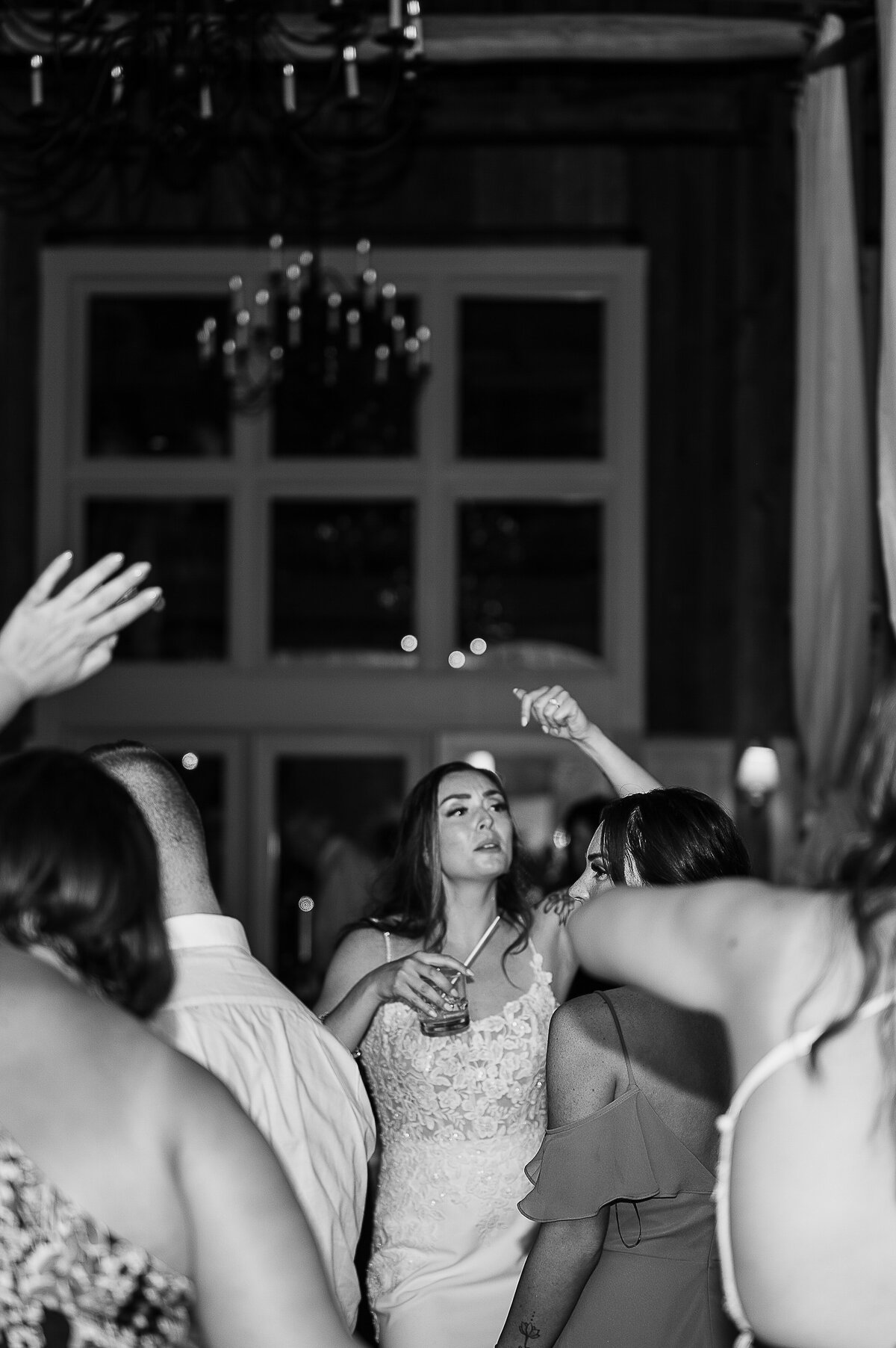 a bride throwing the bouquet at her wedding