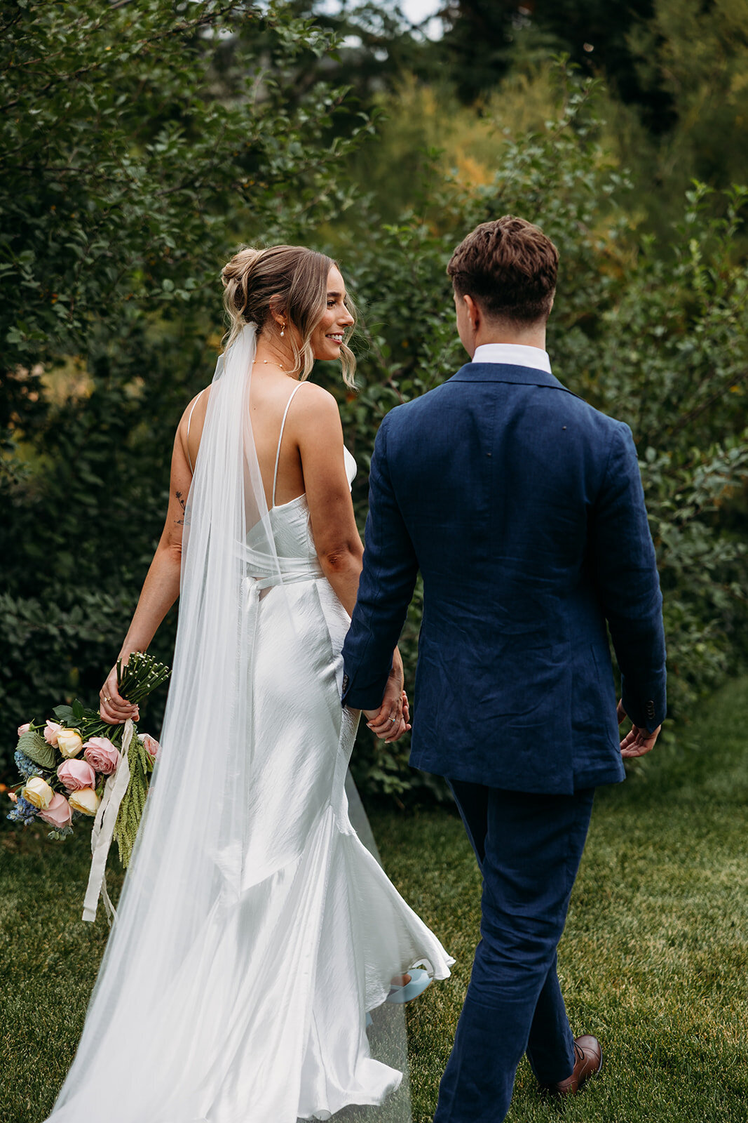 Bride and groom wedding portraits at Poachers Pantry