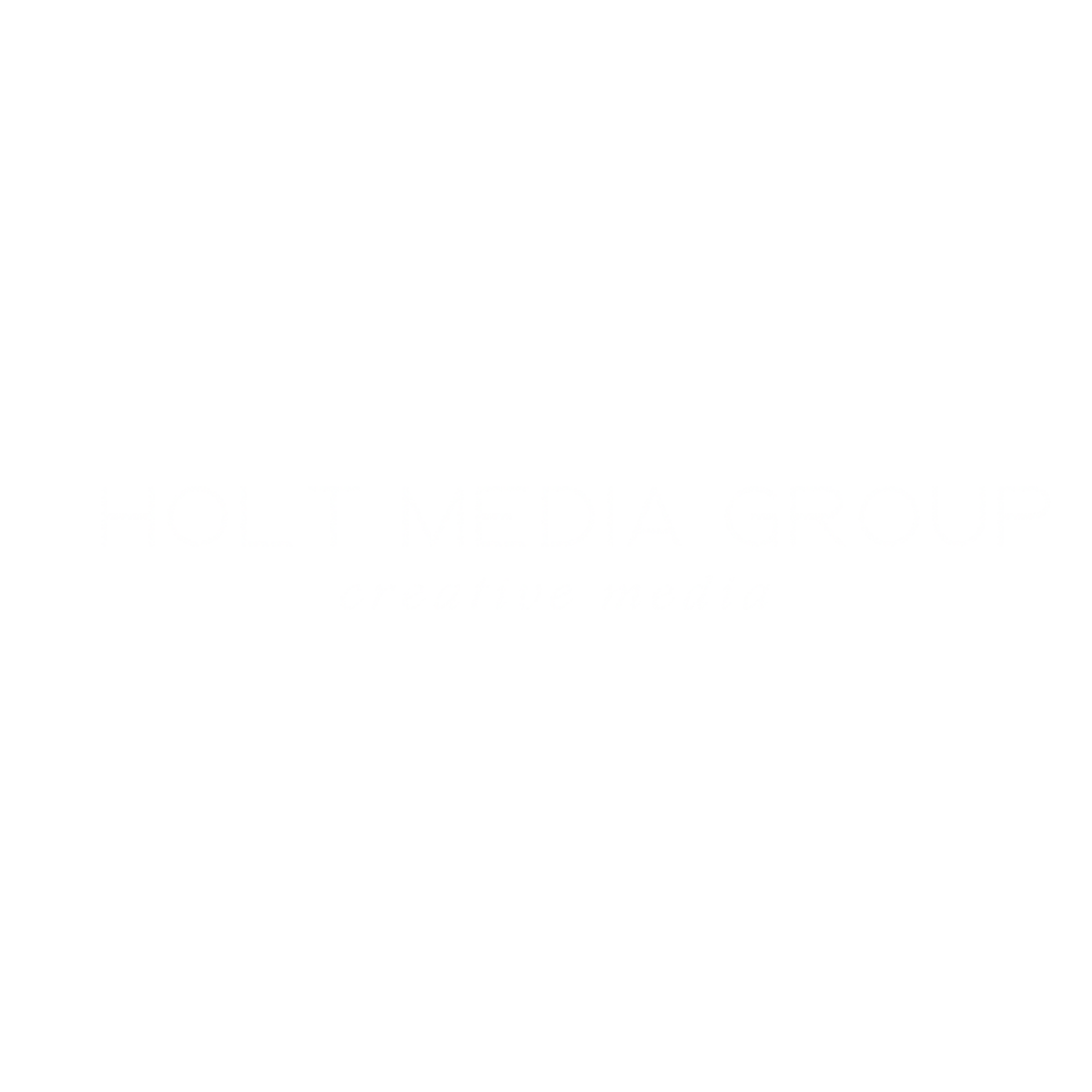 Transparent White logo for Holt Media Group Creative Media
