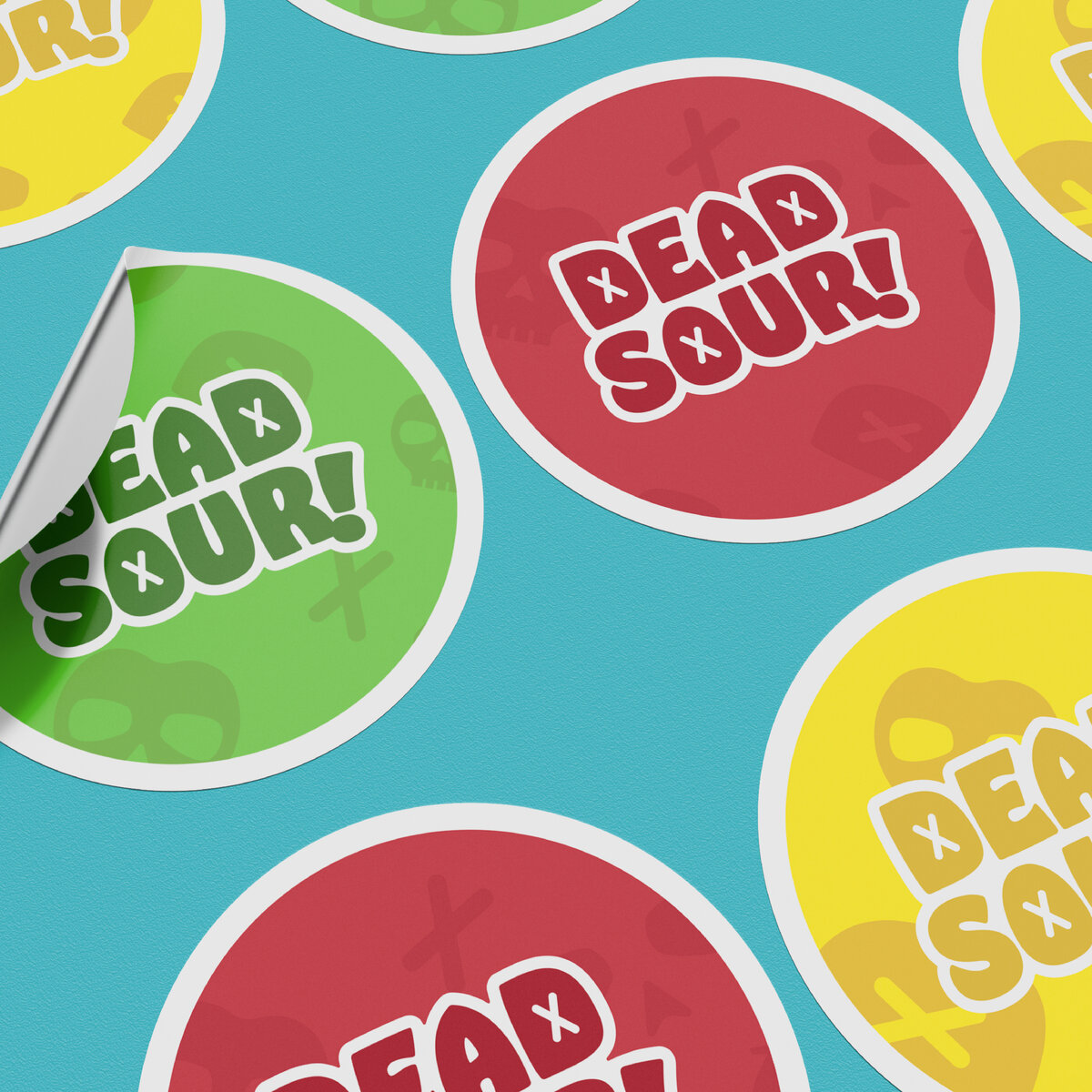 Dead Sour logotype and pattern created by Ayanna Richilano Designs on stickers scattered on a blue backgrounds