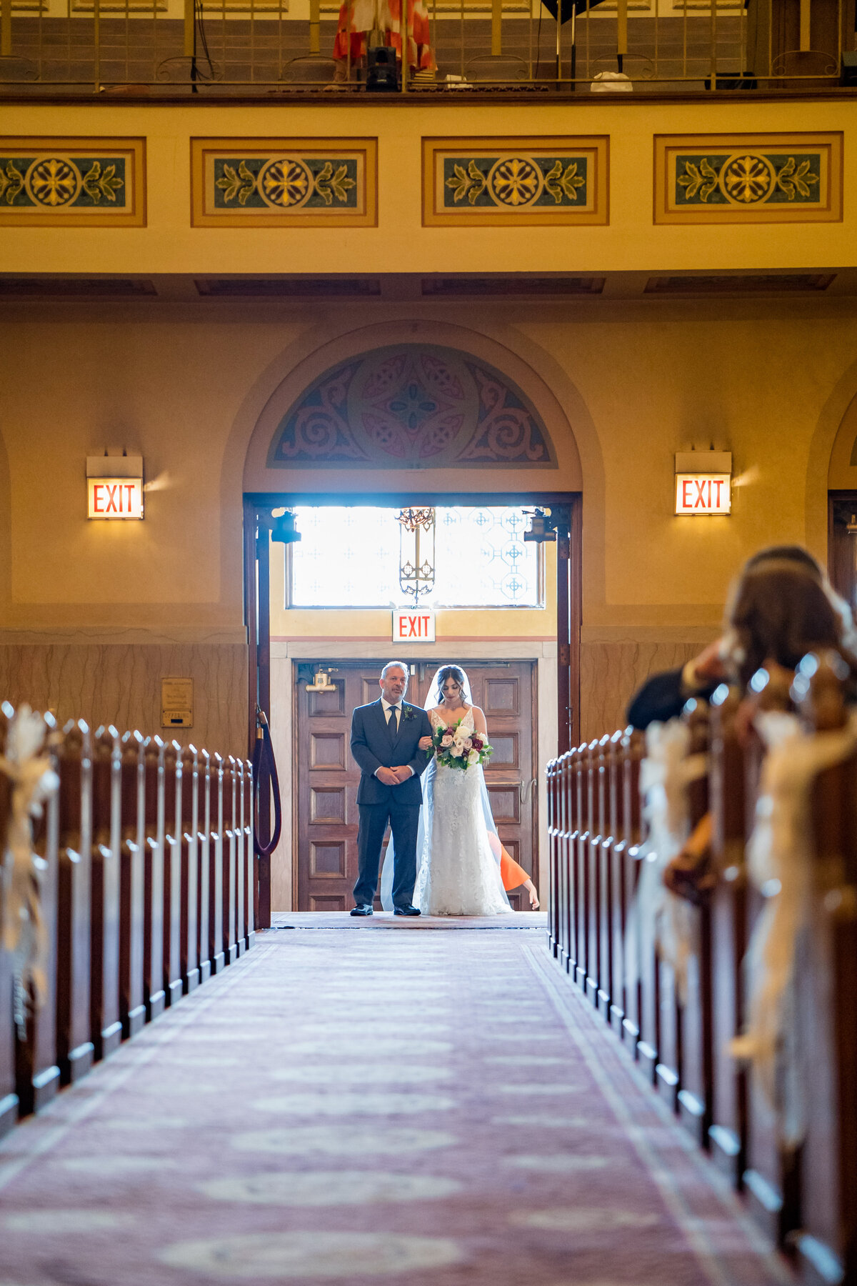 Father walking bride down the aisle