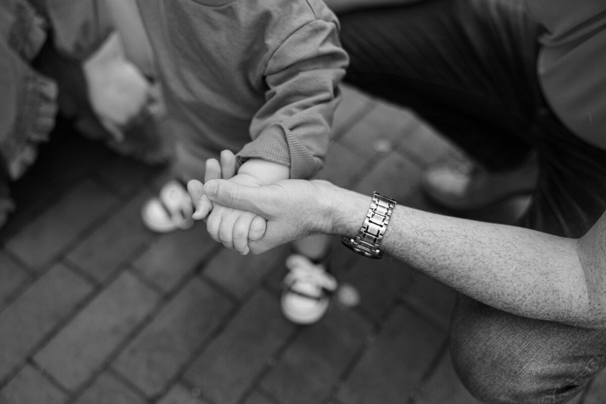 Couple in a park in the Finger Lakes for a family session