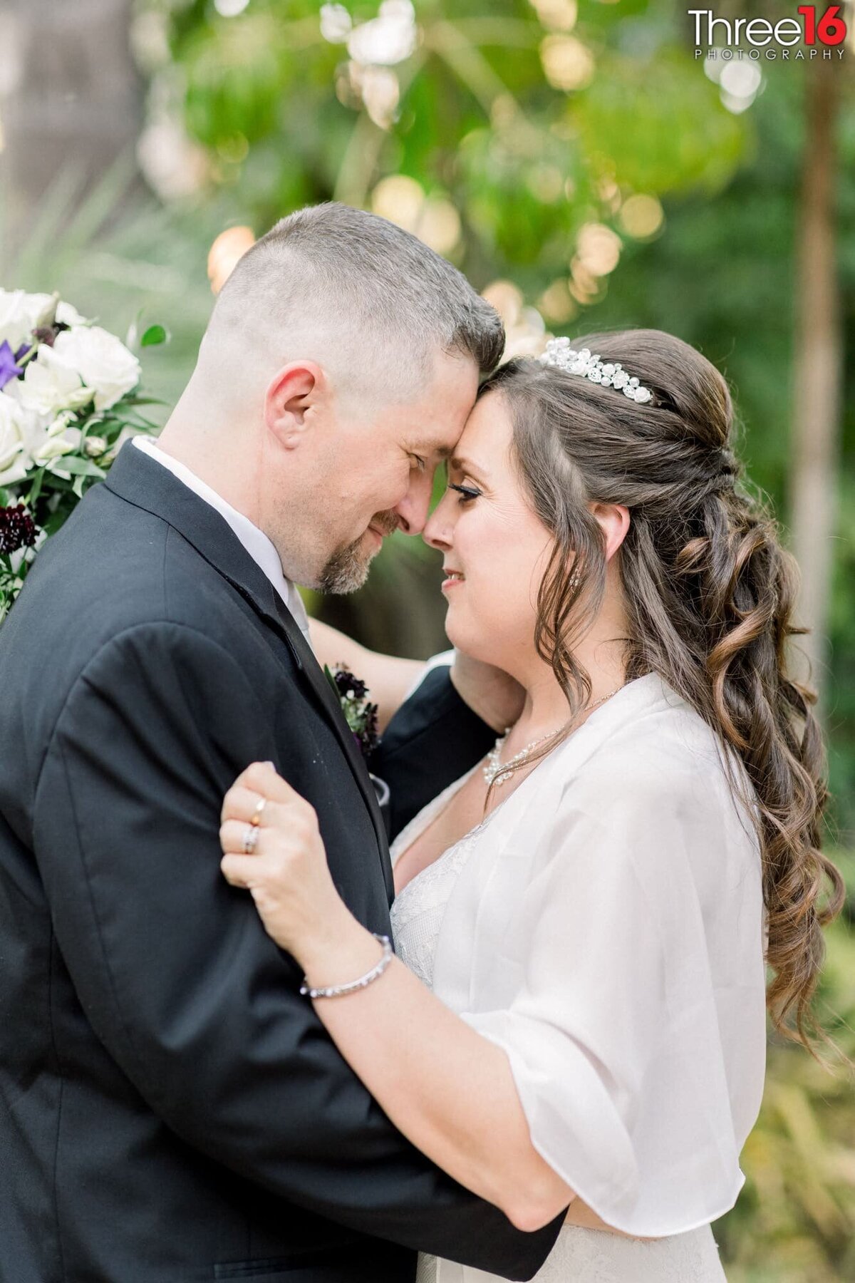 Sweet tender moment between newly married husband and wife