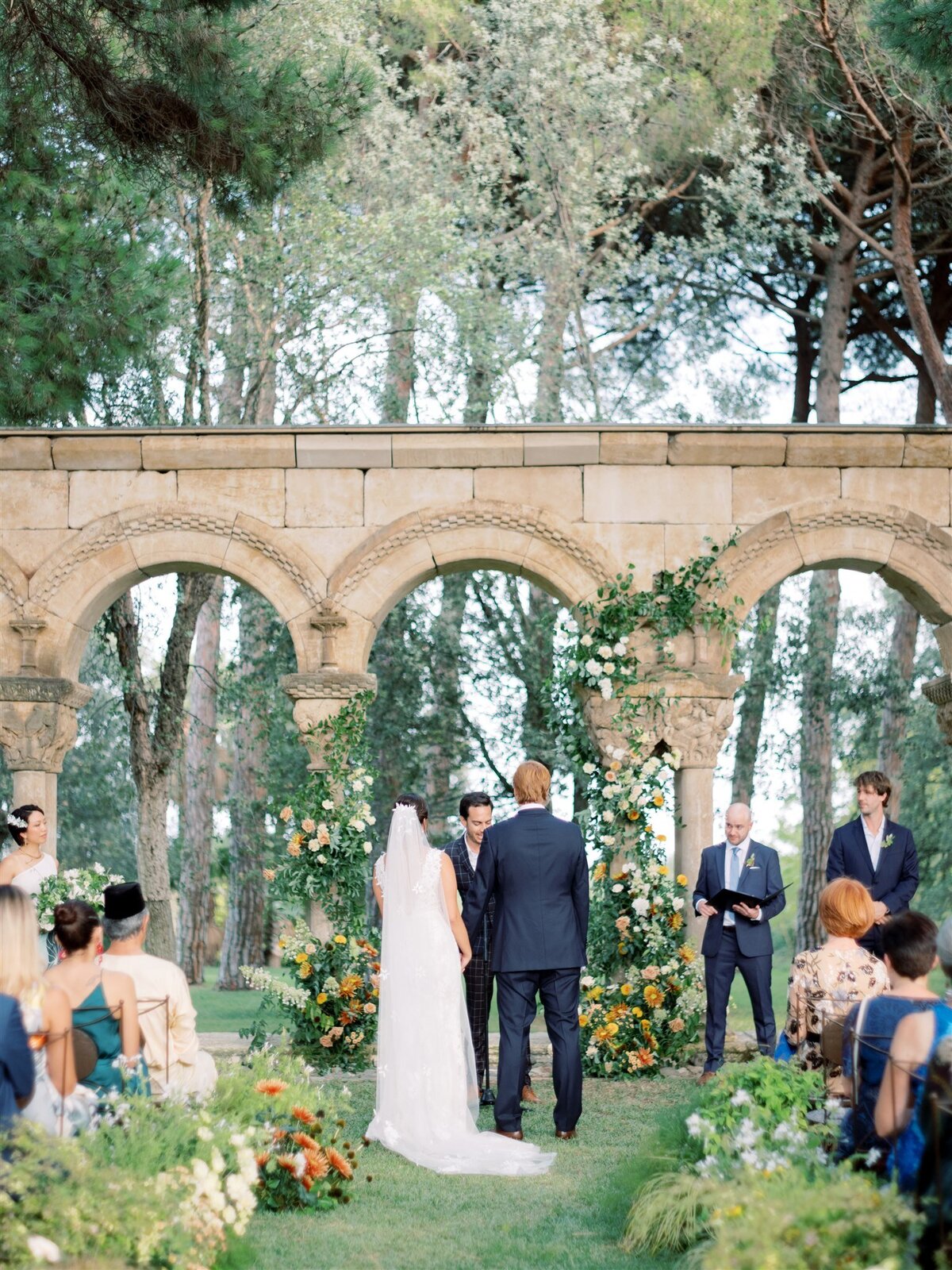 Outside wedding ceremony, nature-inspired  arch
