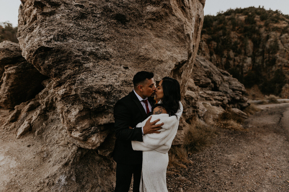 newlyweds holding each other in Jemez Springs, New Mexico