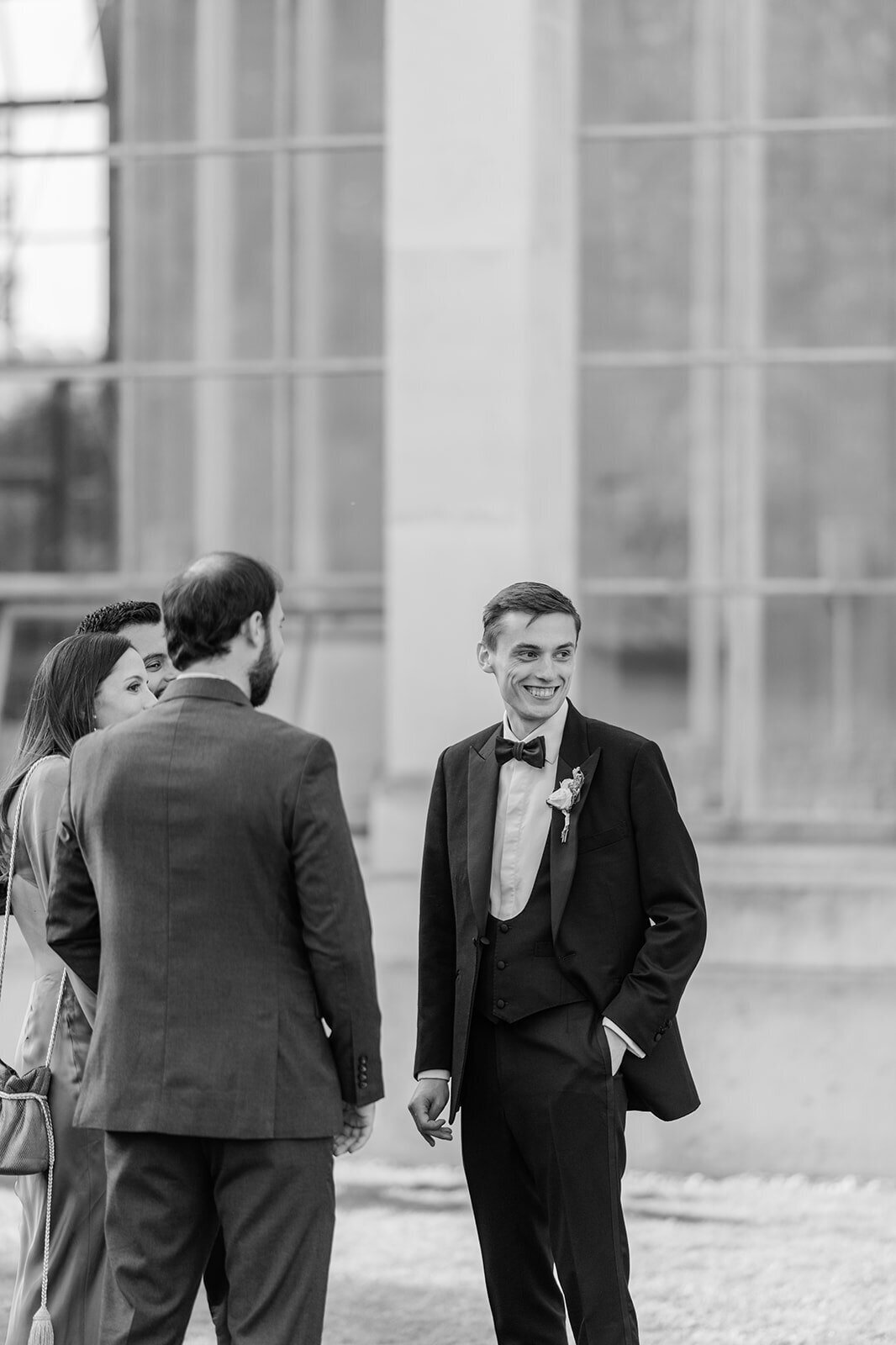 groom-in-black-tie-min
