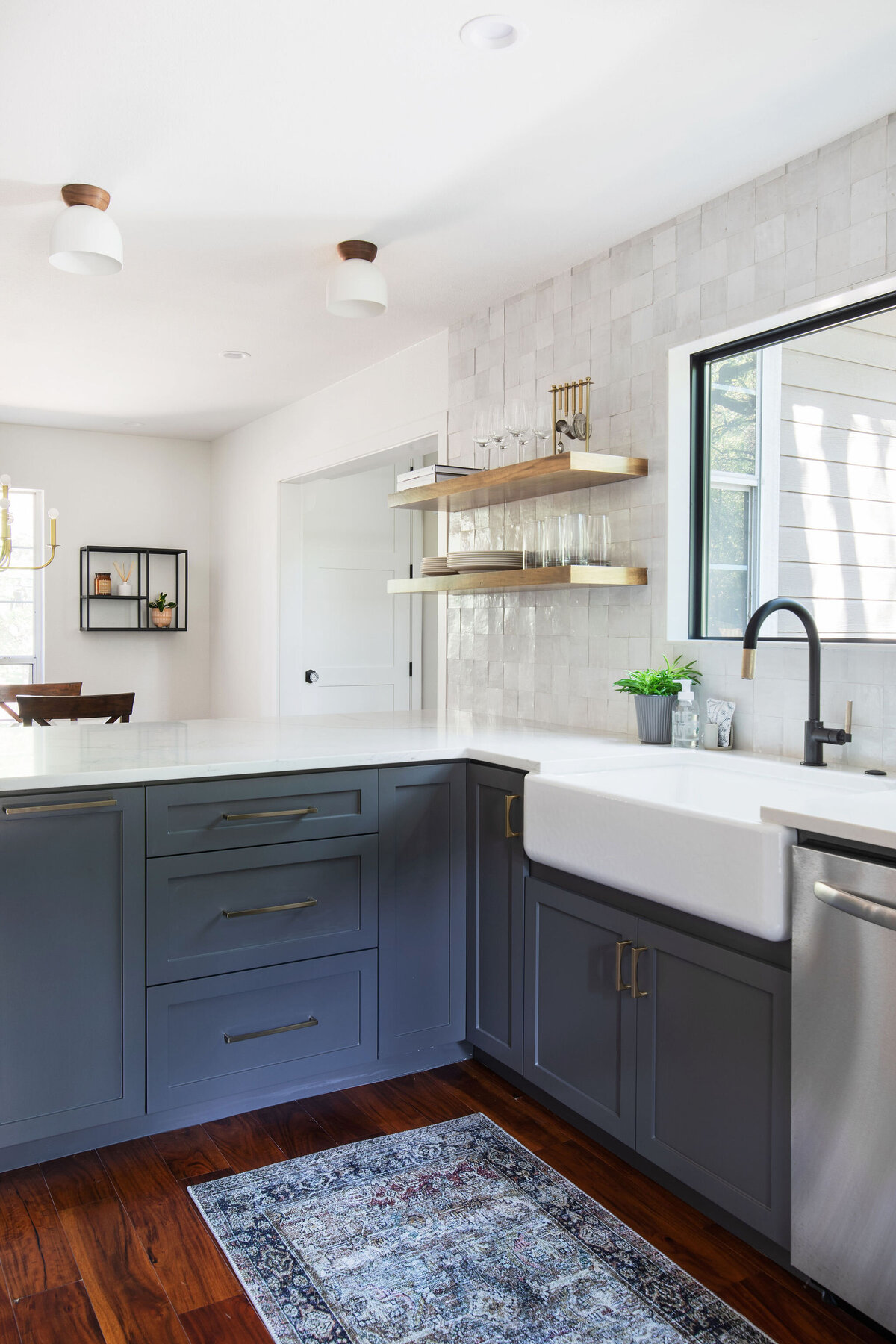 hello-home-two-tone-cabinets-kitchen-remodel-hardwood-flooring-waterfall-peninsula-zellige-backsplash-austin-9