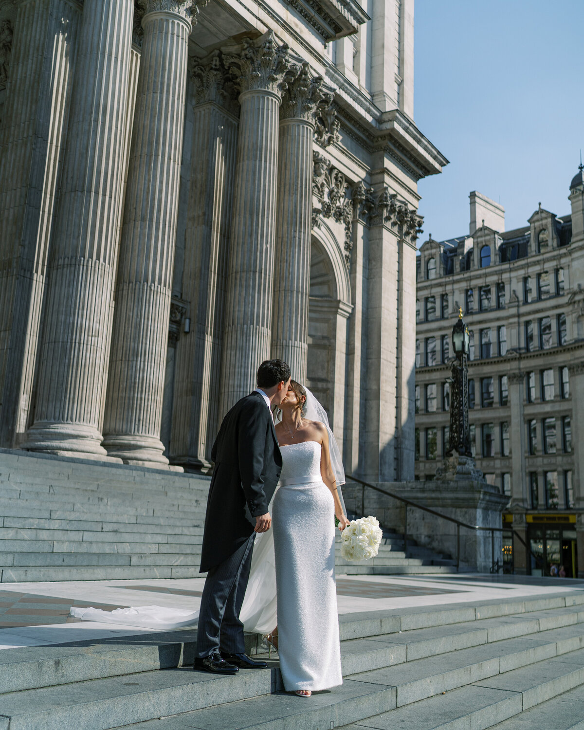 Bride and groom outside St. Paul's cathedral