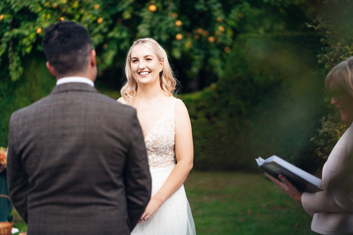 Pauntley-court-wedding-photographer-bride-during-outdoor-ceremony