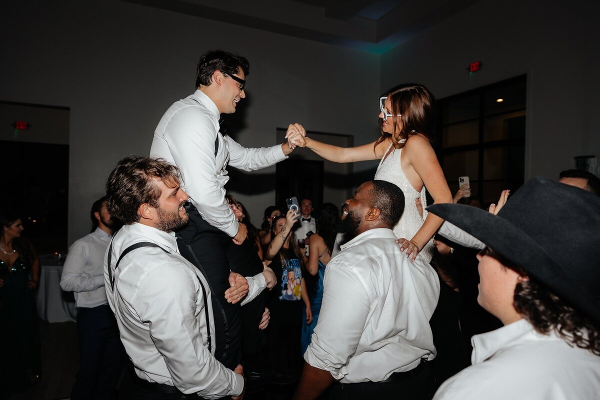bride and groom dancing at wedding reception in texas