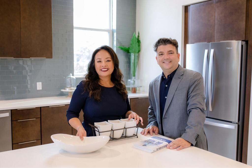 Katty and Salvatore in the kitchen, enjoying time together. Ideal for branding photoshoot ideas focused on home life, recipes, and shared culinary experiences.