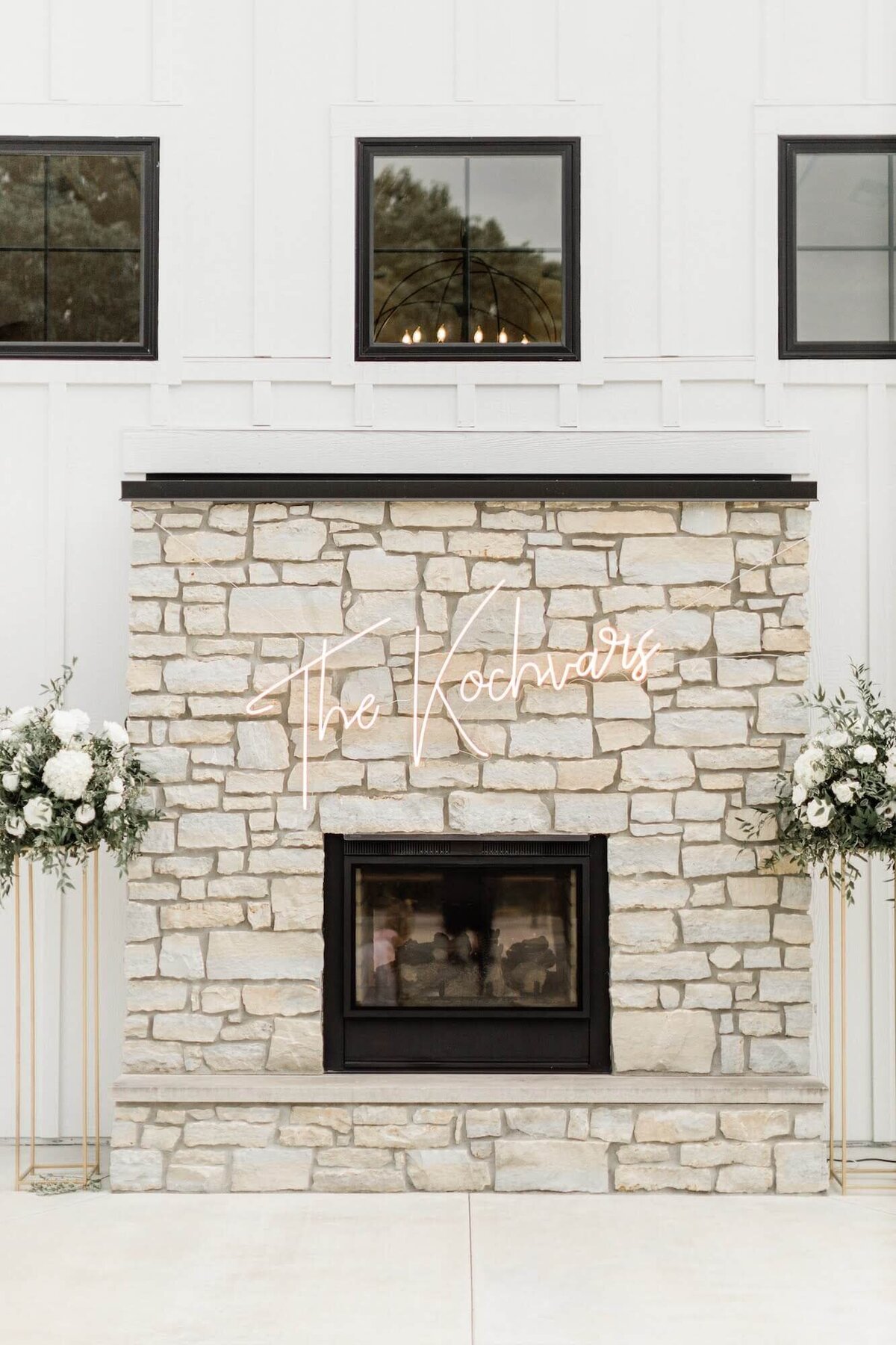 Michelle Kochvar wedding - fireplace with florals