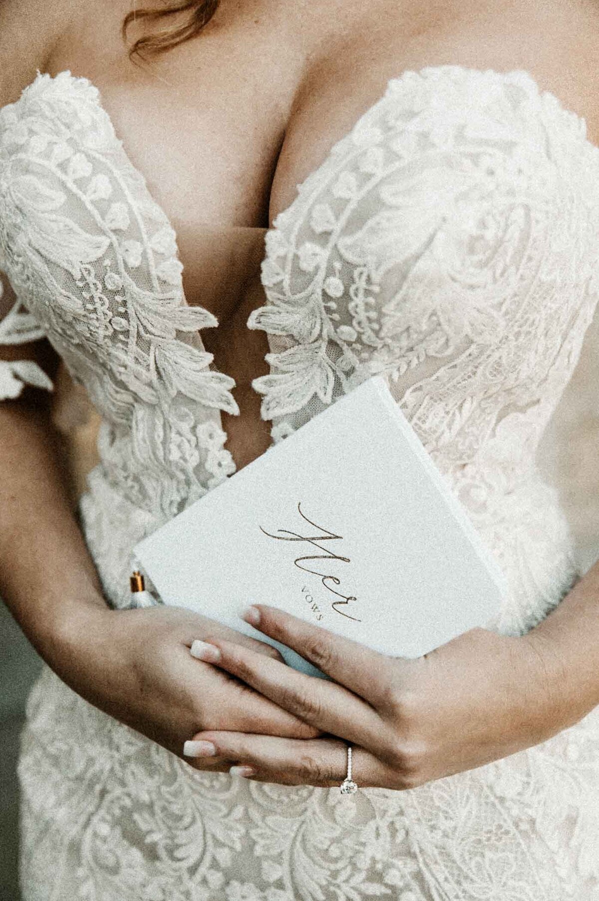 Her-Vow-book-detail-shot-Silver-Oaks-Chateau-Missouri-Wedding-Photographer