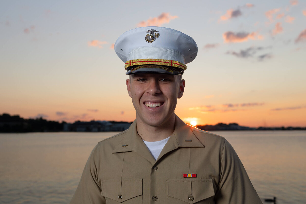 Marine officer in uniform during sunrise on the Chesapeke Bay in Annapolis.