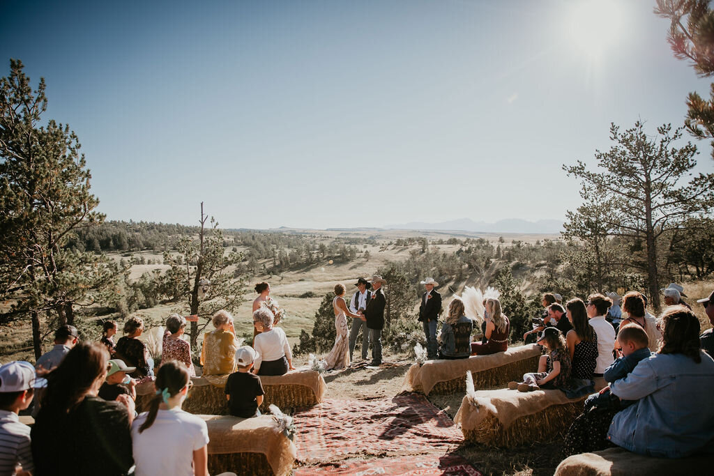 Stunning wedding ceremony on a rocky outcrop