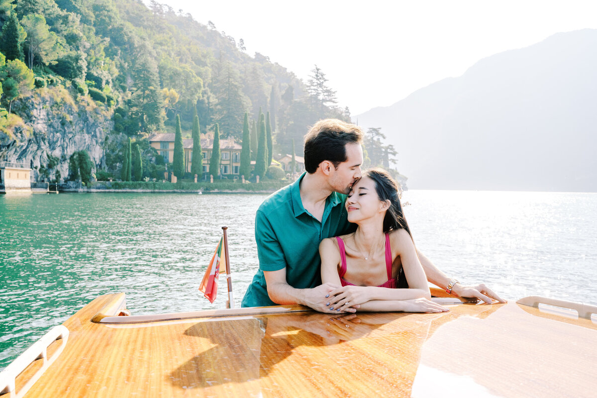 Boat ride engagement session on Lake Como in Italy photographed by Lake Como Photographer