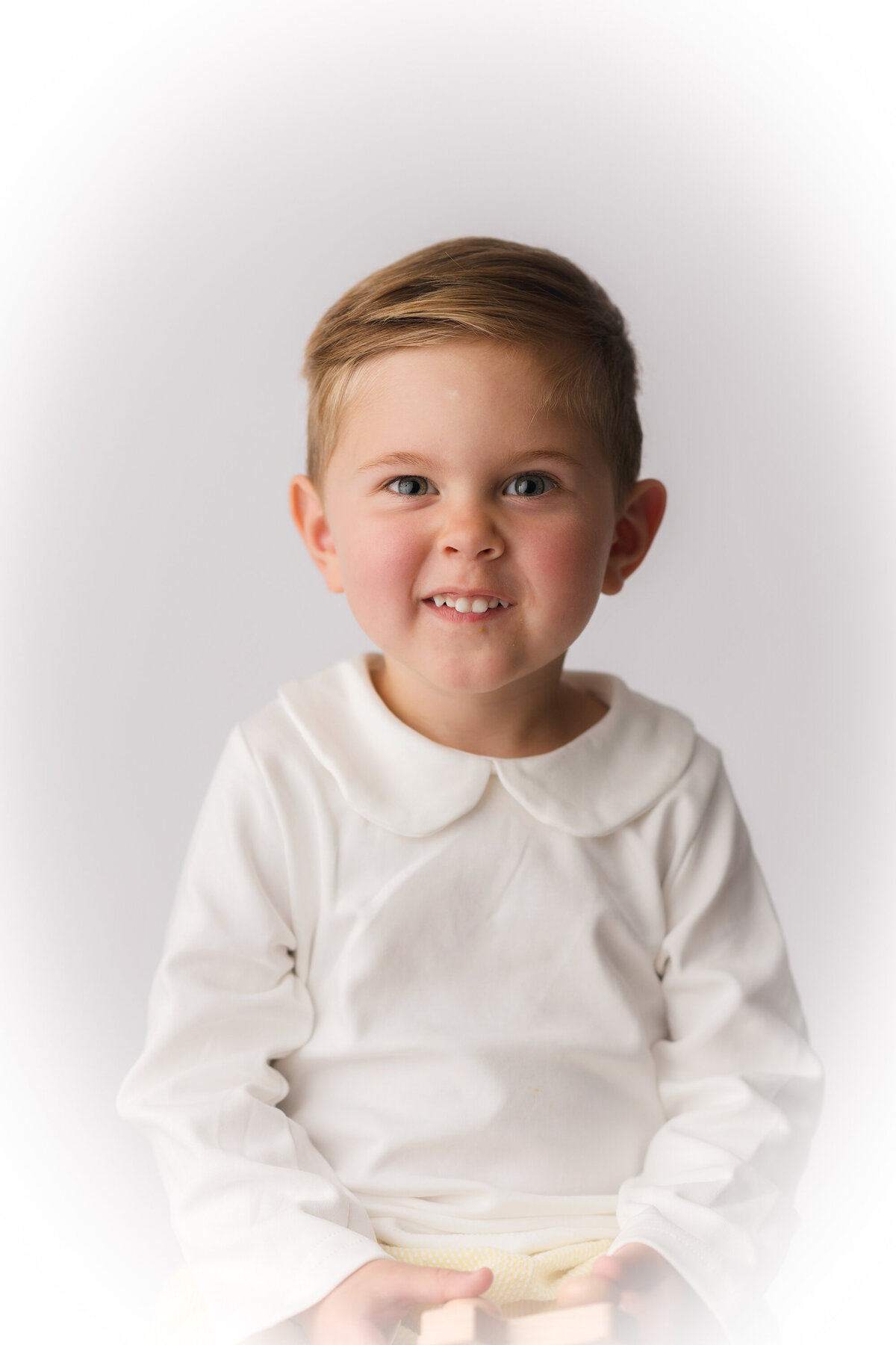 Little boy poses for Heirloom Photography session in Charleston, South Carolina.