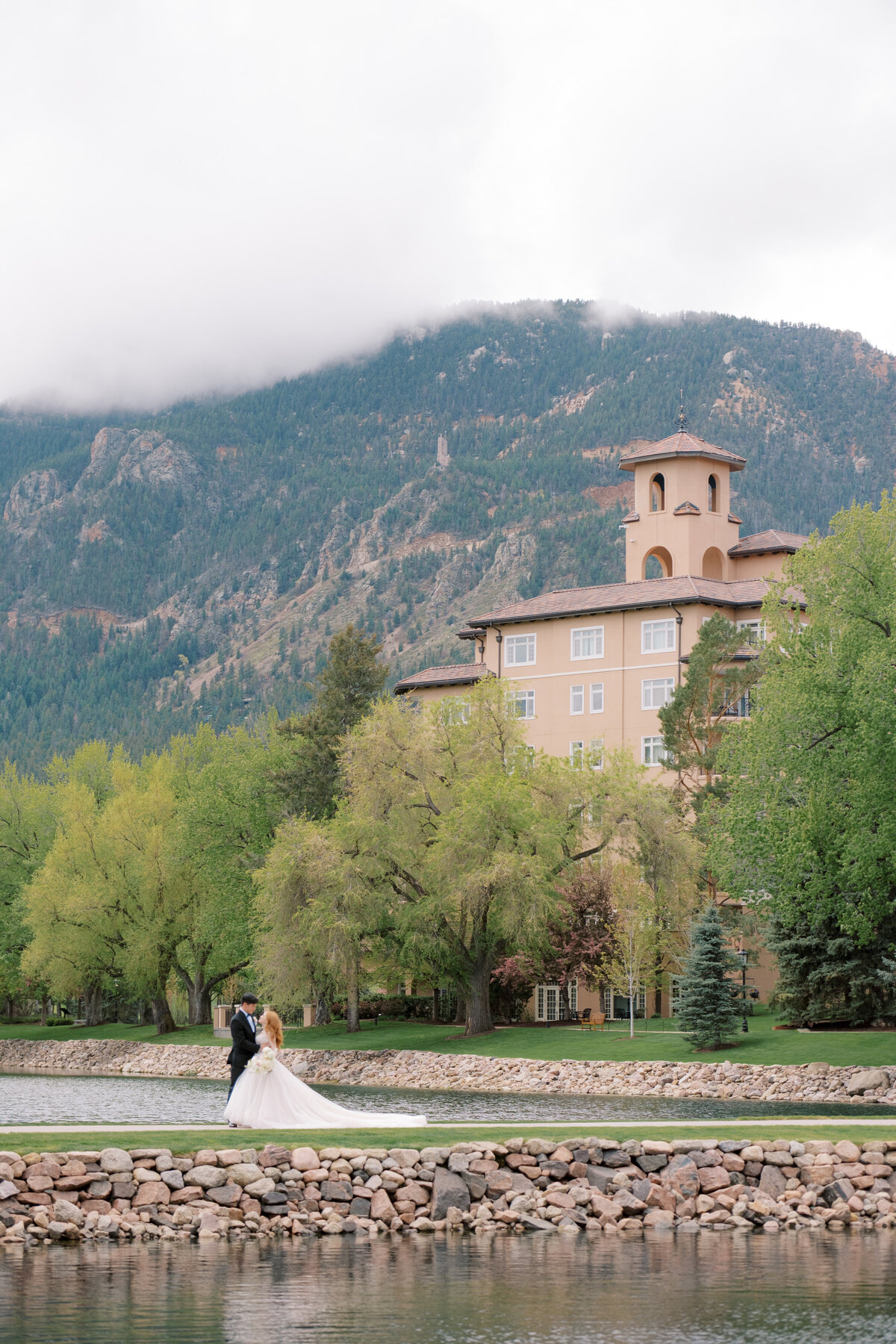 bride and groom epic portrait at The Broadmoor Resort in Colorado Springs, Colorado