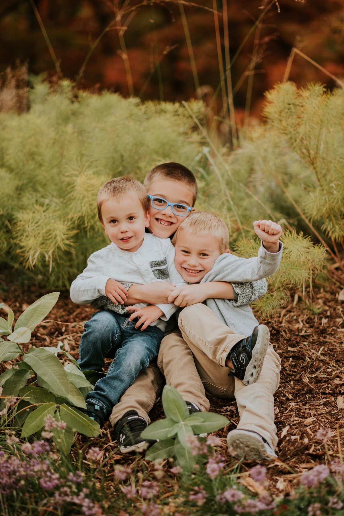 Experience park playfulness in St. Paul family portraits by Shannon Kathleen Photography. Your family's laughter becomes art. Book your session today!