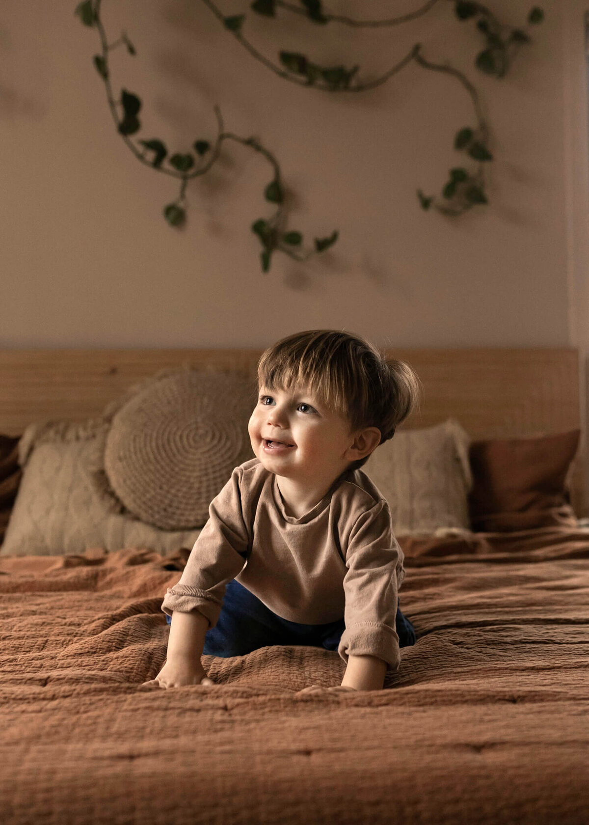NJ baby photographer captures big brother on the bed