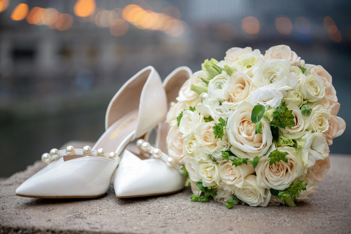 White bride's shoes and wedding bouquet in Chicago