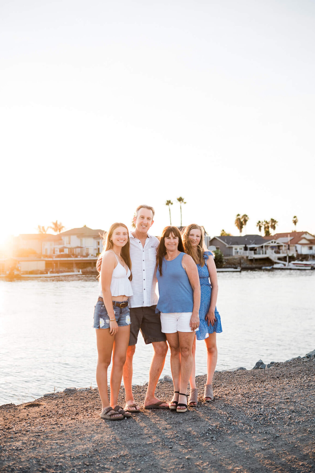 Family of four near water