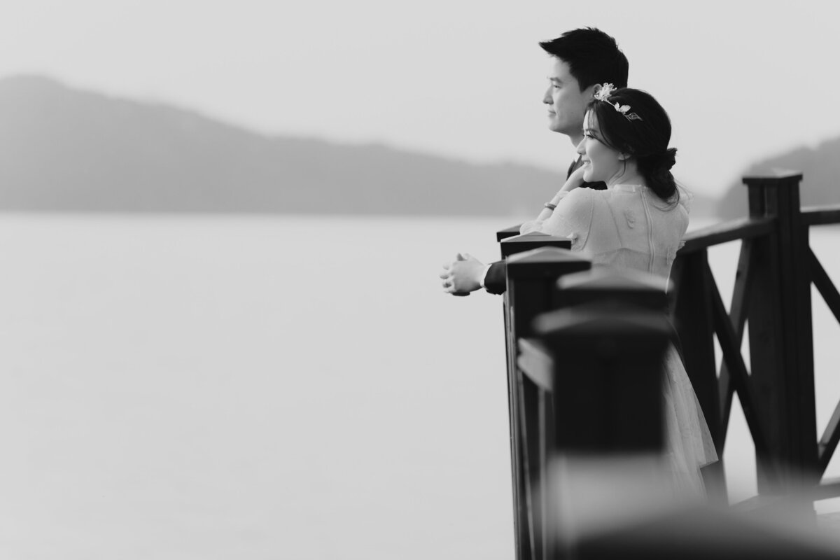 a couple are looking at the lake in Gwangju South Korea