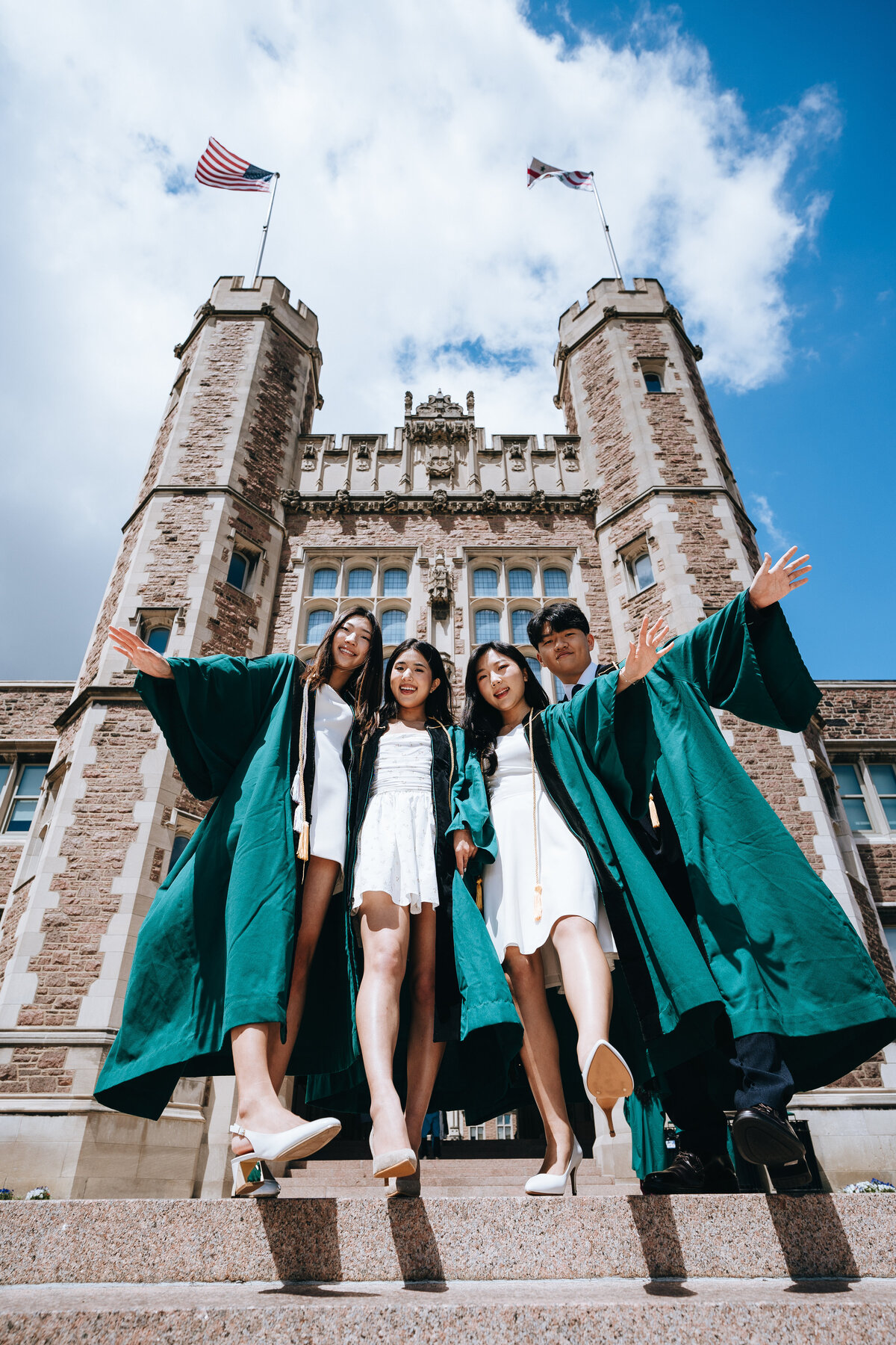 group of washu in saint louis graduates in front of brookings hall