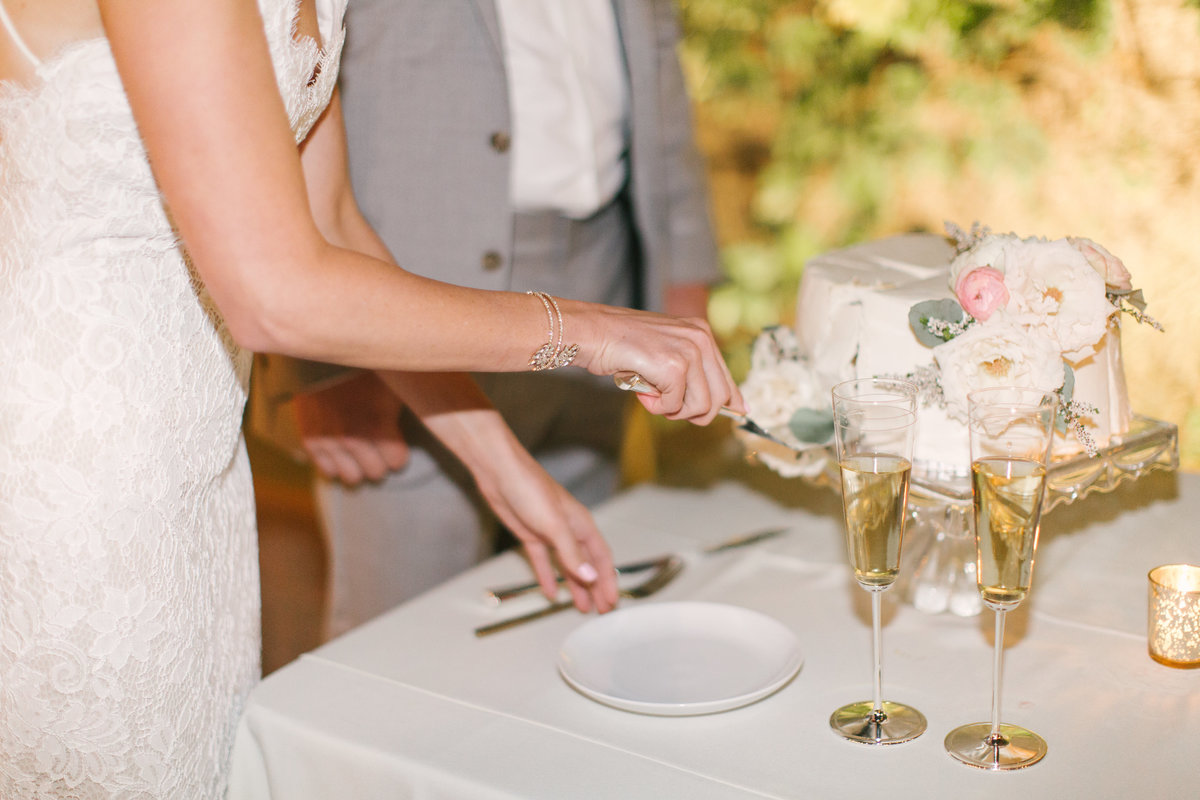 Bride and groom cut the cake at Firestone Vineyard wedding