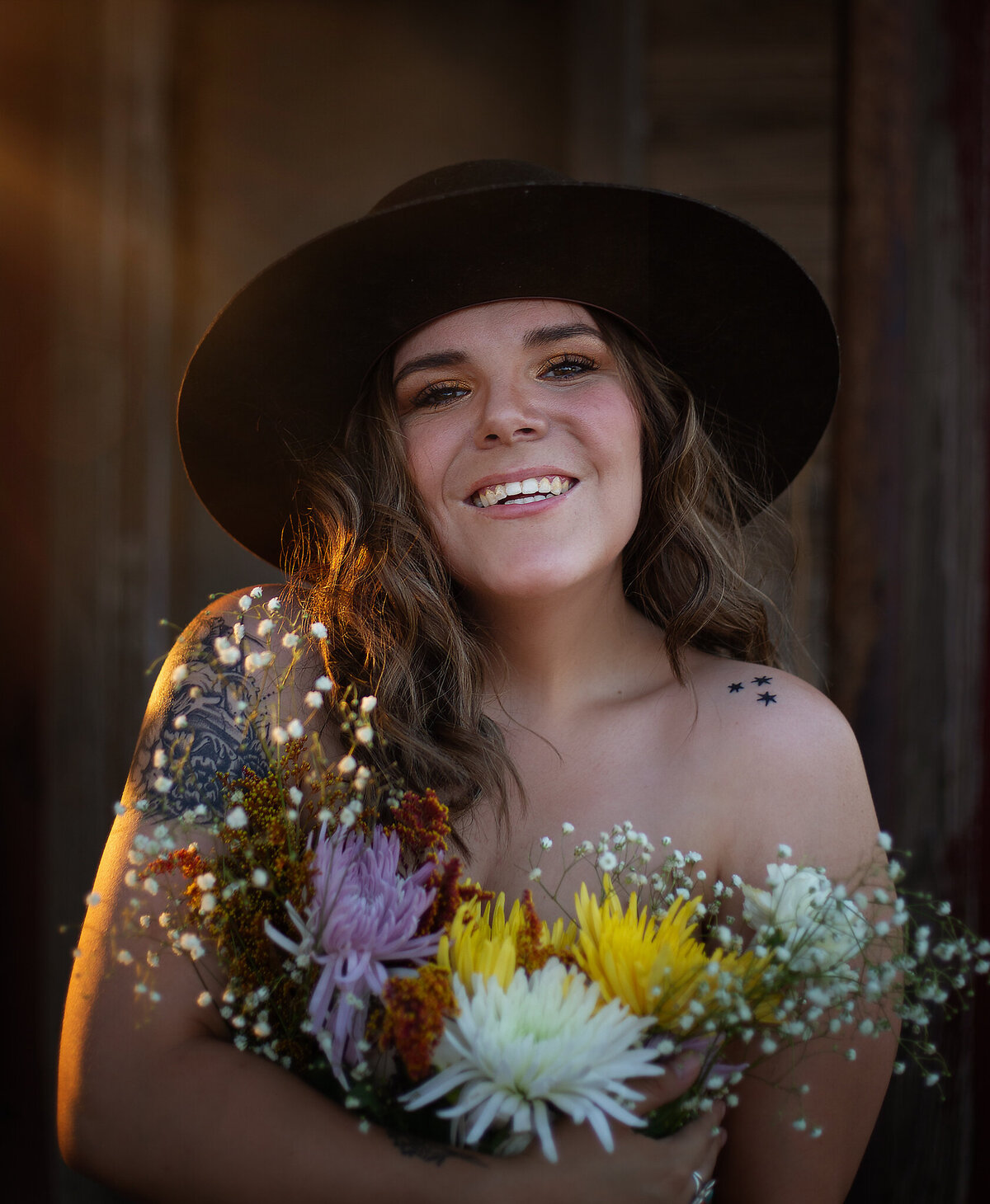 flower bra boudoir session outdoors in the country by a barn