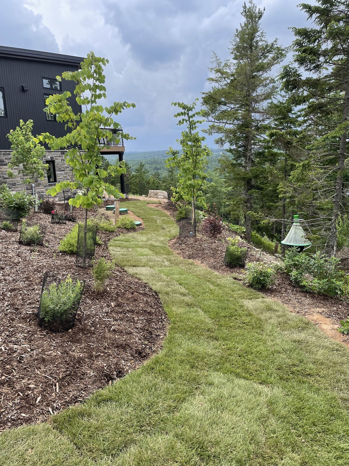 Ground Down Land Management - Halifax Excavation Services - Stone Landscaping Patio Work - sod installation - garden beds & mulch