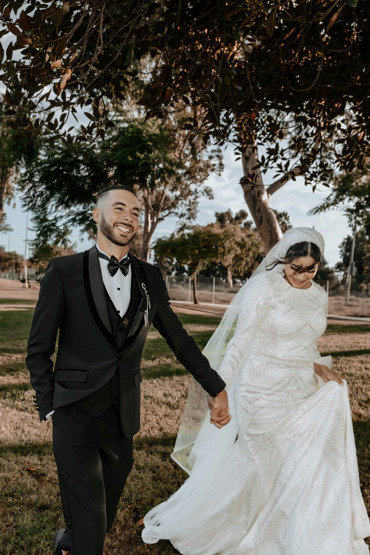 Joyful Bride and Groom Walking Together – Los Angeles Outdoor Wedding Photography