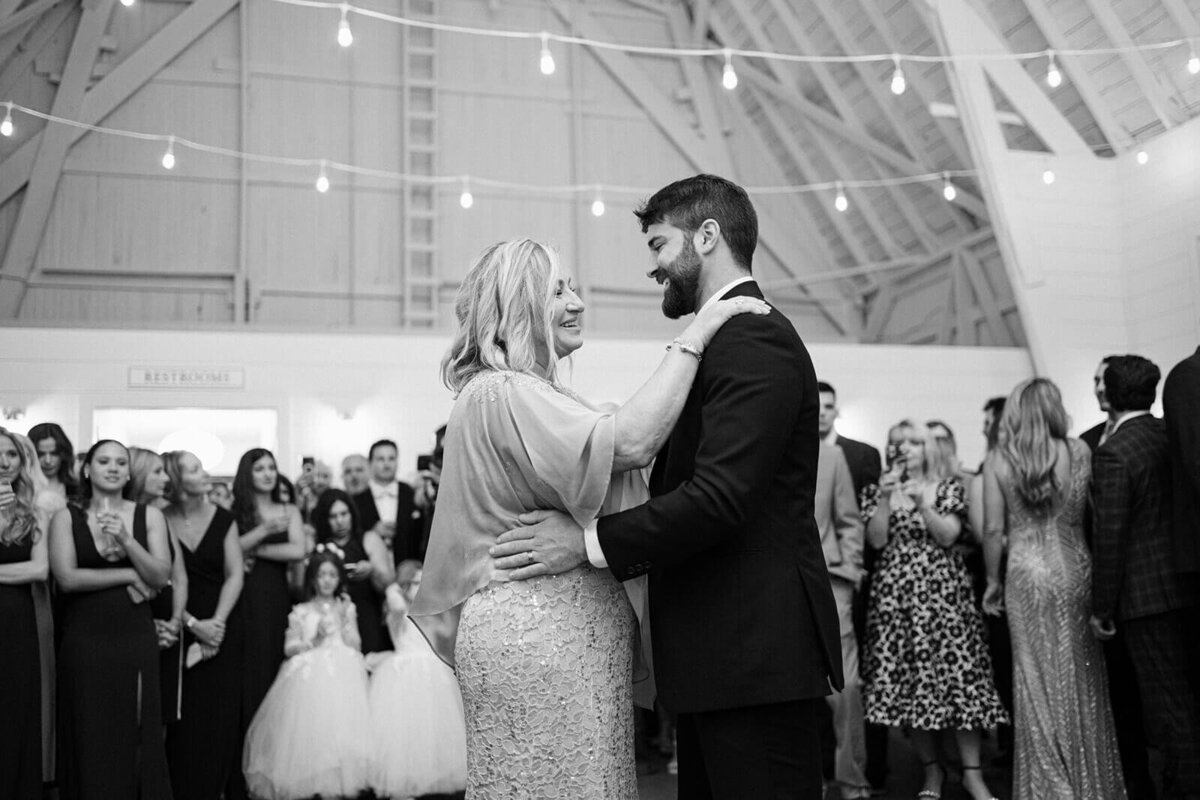 Groom dancing with mother at Finger Lakes Wedding reception, NY