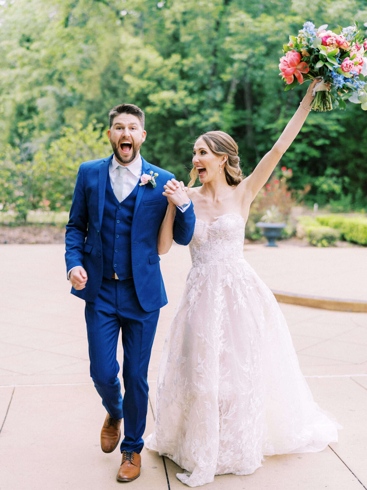 Joyful bride and groom celebrate their new marriage in Dallas Texas at Ashton Gardens