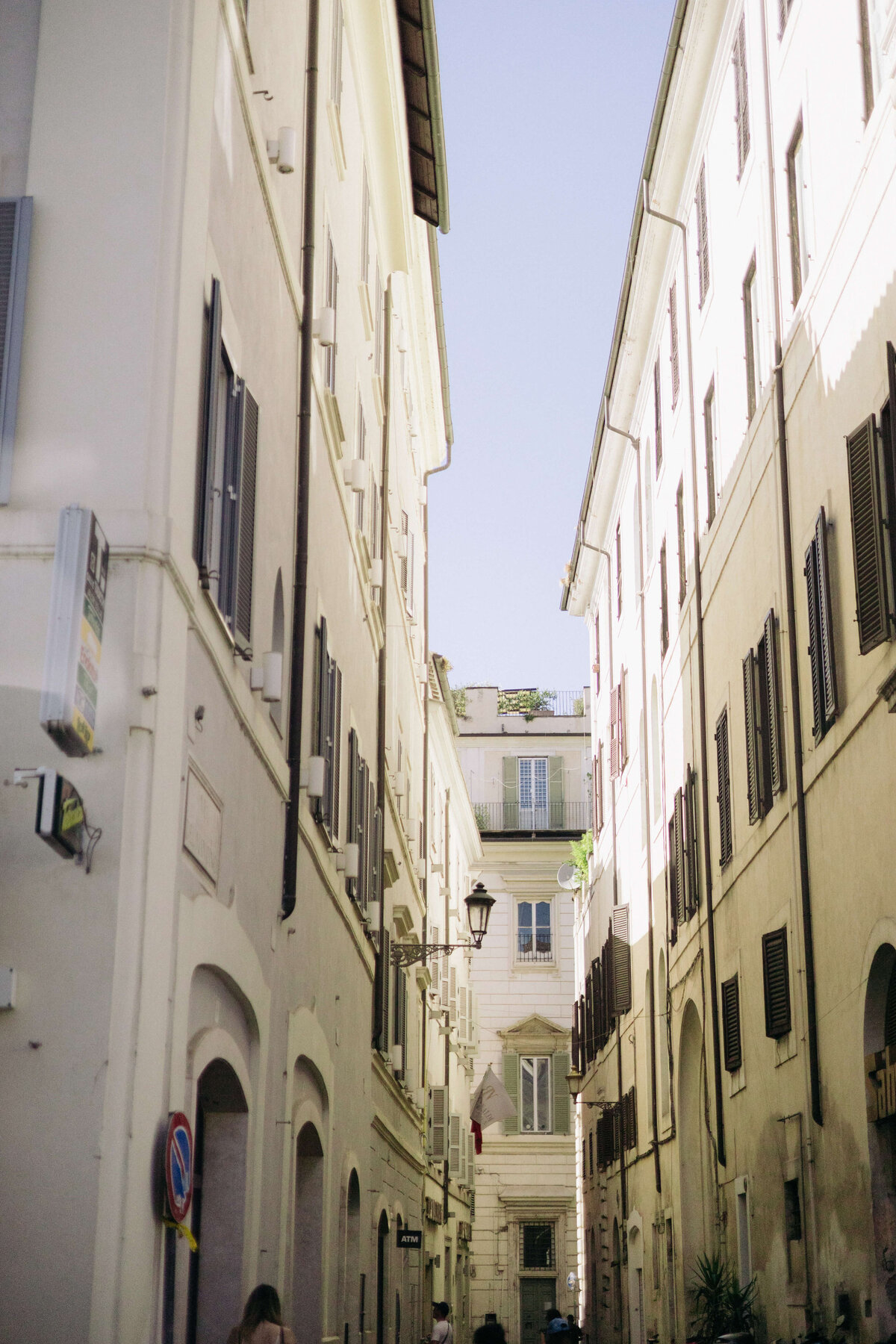 Narrow Roman alleyway leading to historic wedding church

