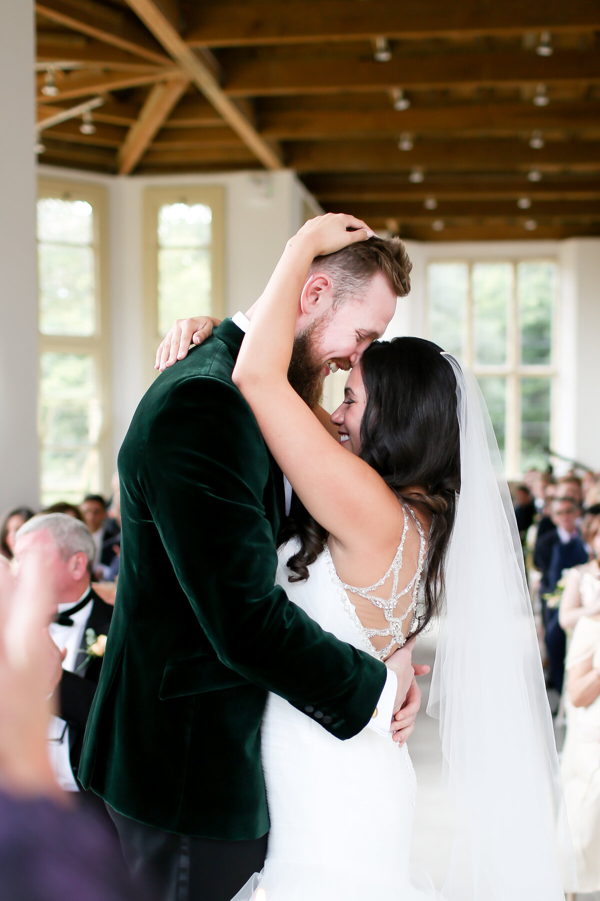 bride-and-groom-embrace-at-luxury-wedding-in-sussex