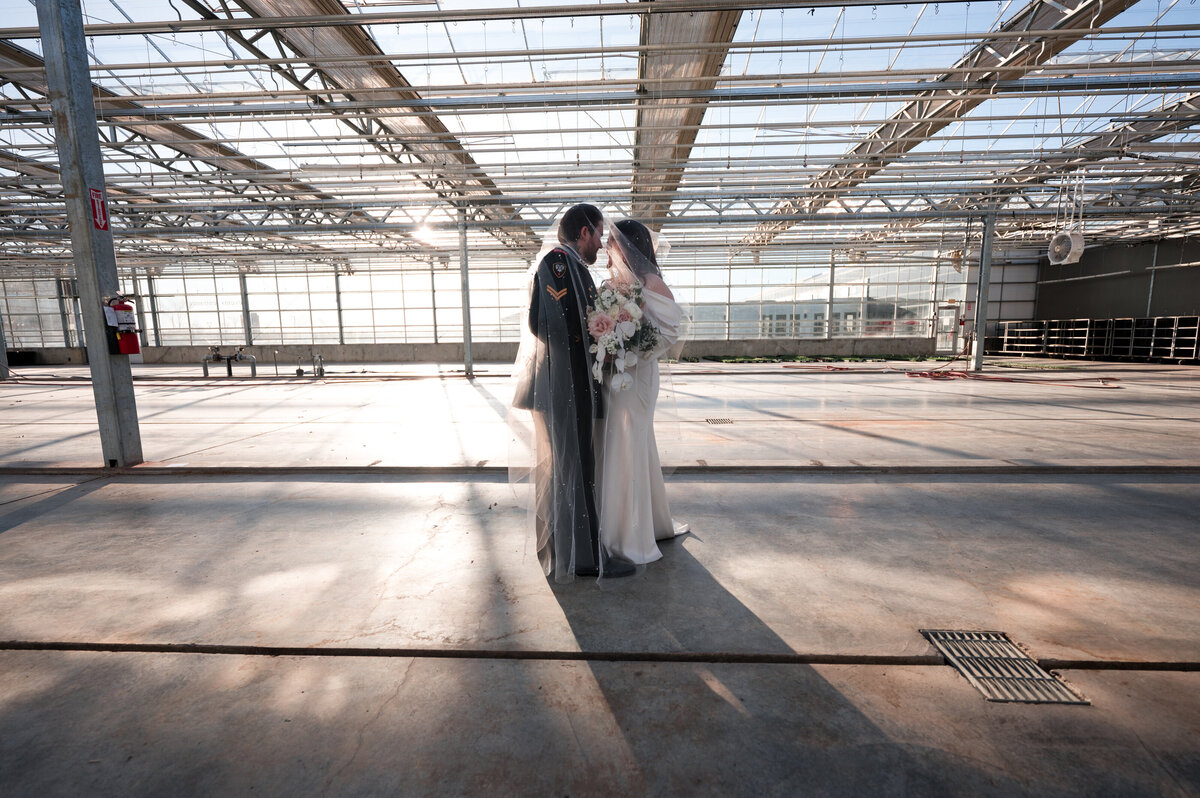 Bride and groom celebrating their wedding at the Enjoy Centre in St. Albert